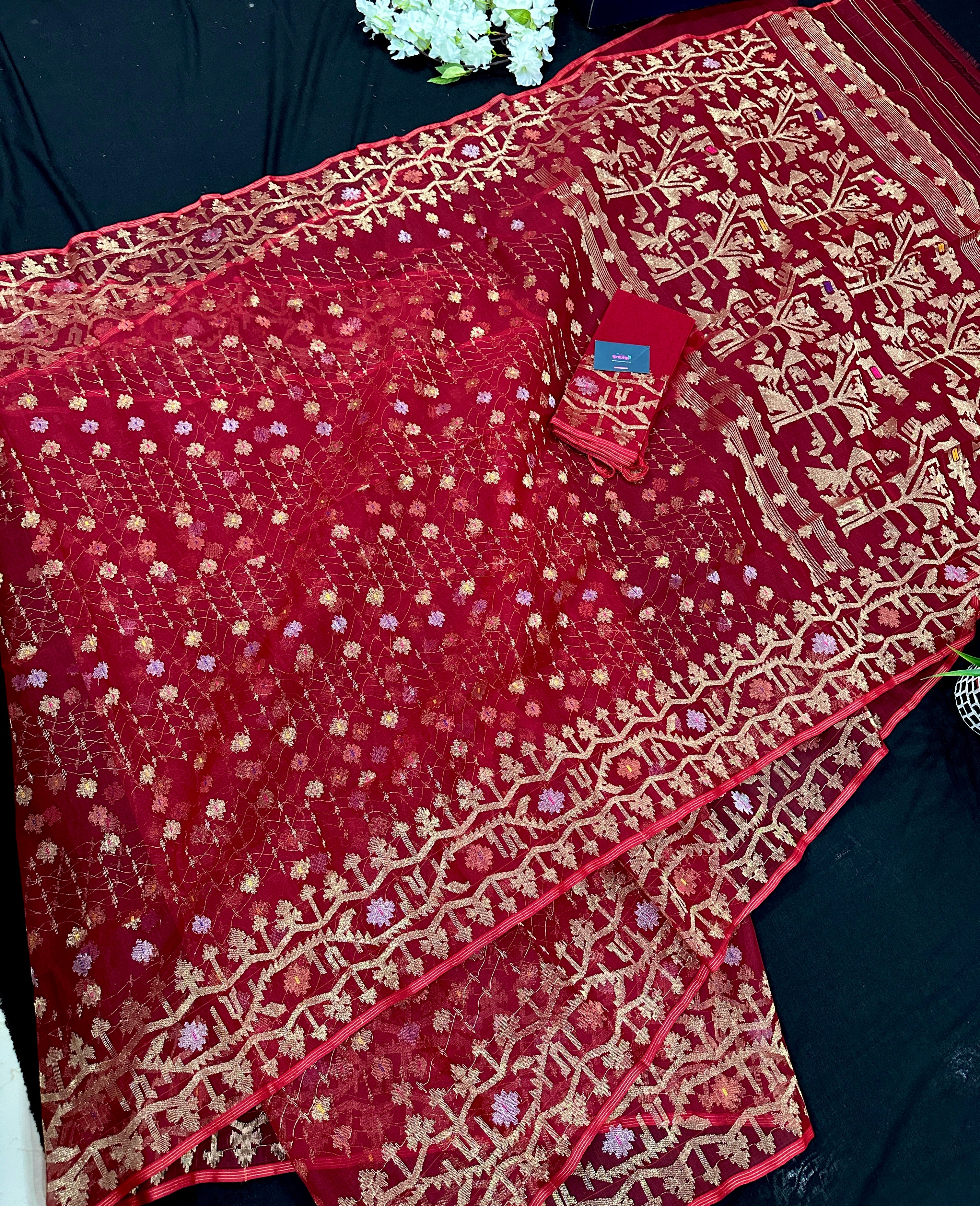 Reddish Maroon Bridal Exclusive dhakai jamdani saree with all over golden jori work soft count.