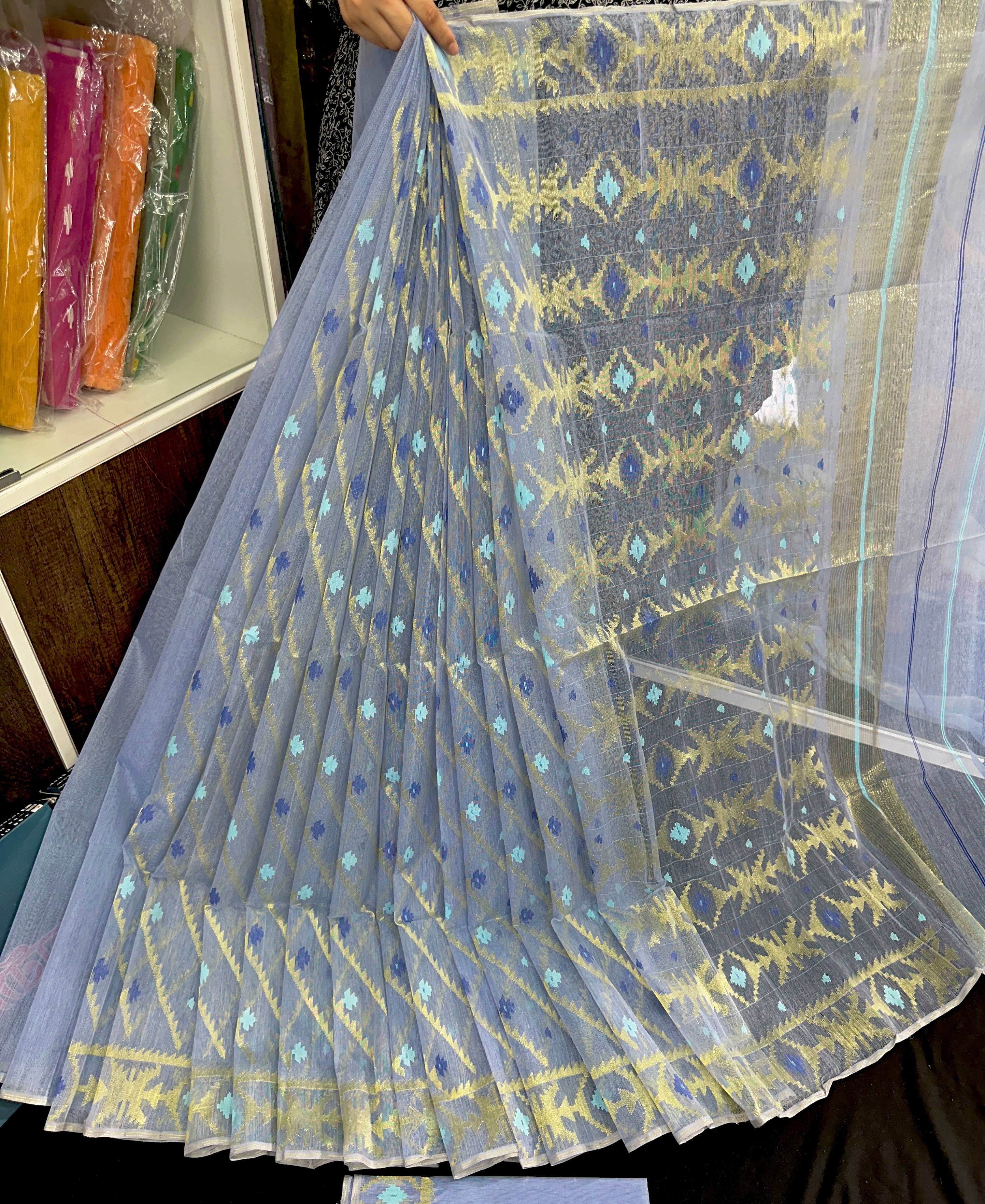 Surma colour halfsilk jamdani saree with golden jori work and blue threads work