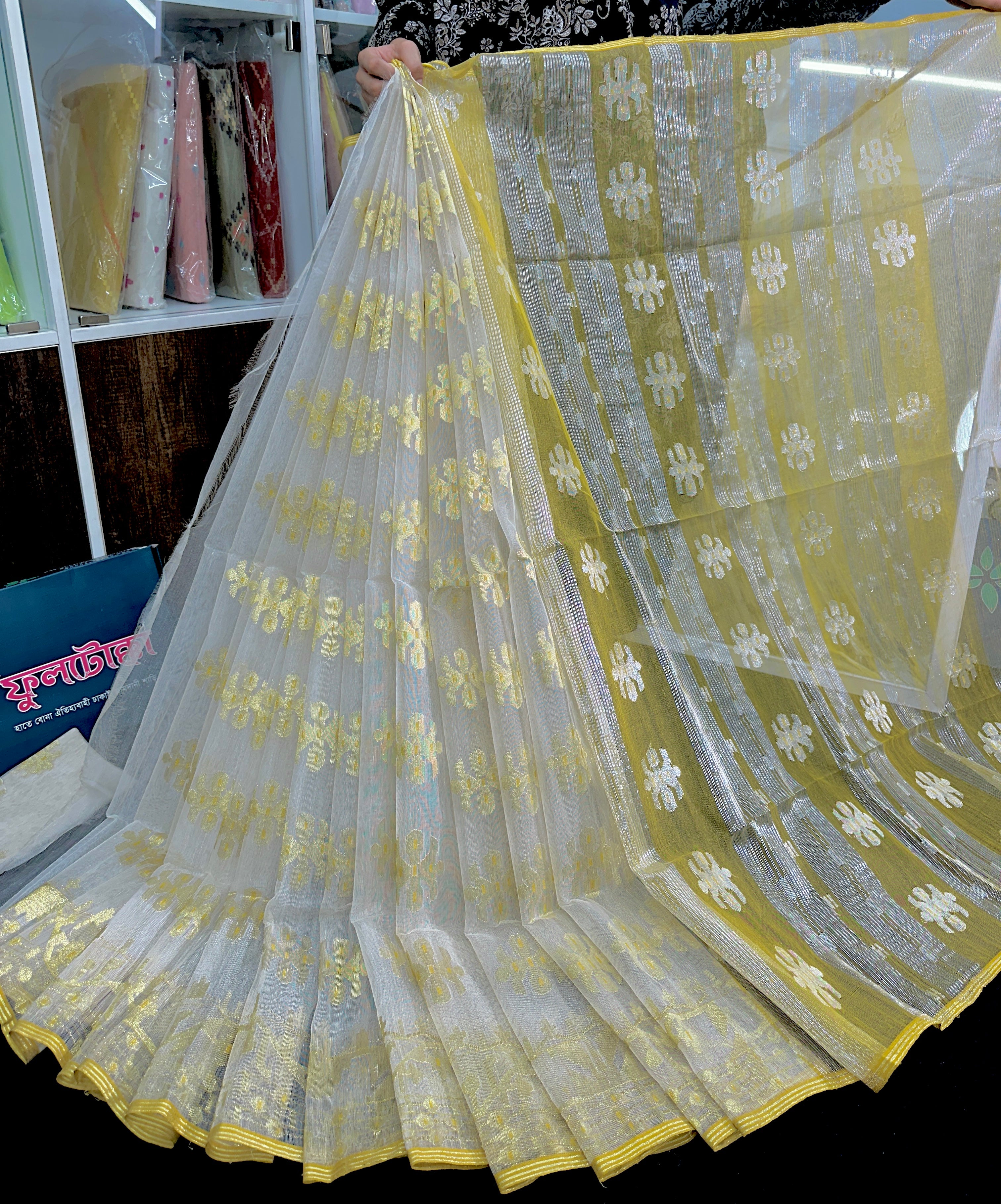 Creamy white halfsilk jamdani saree with golden jori work and blouse piece