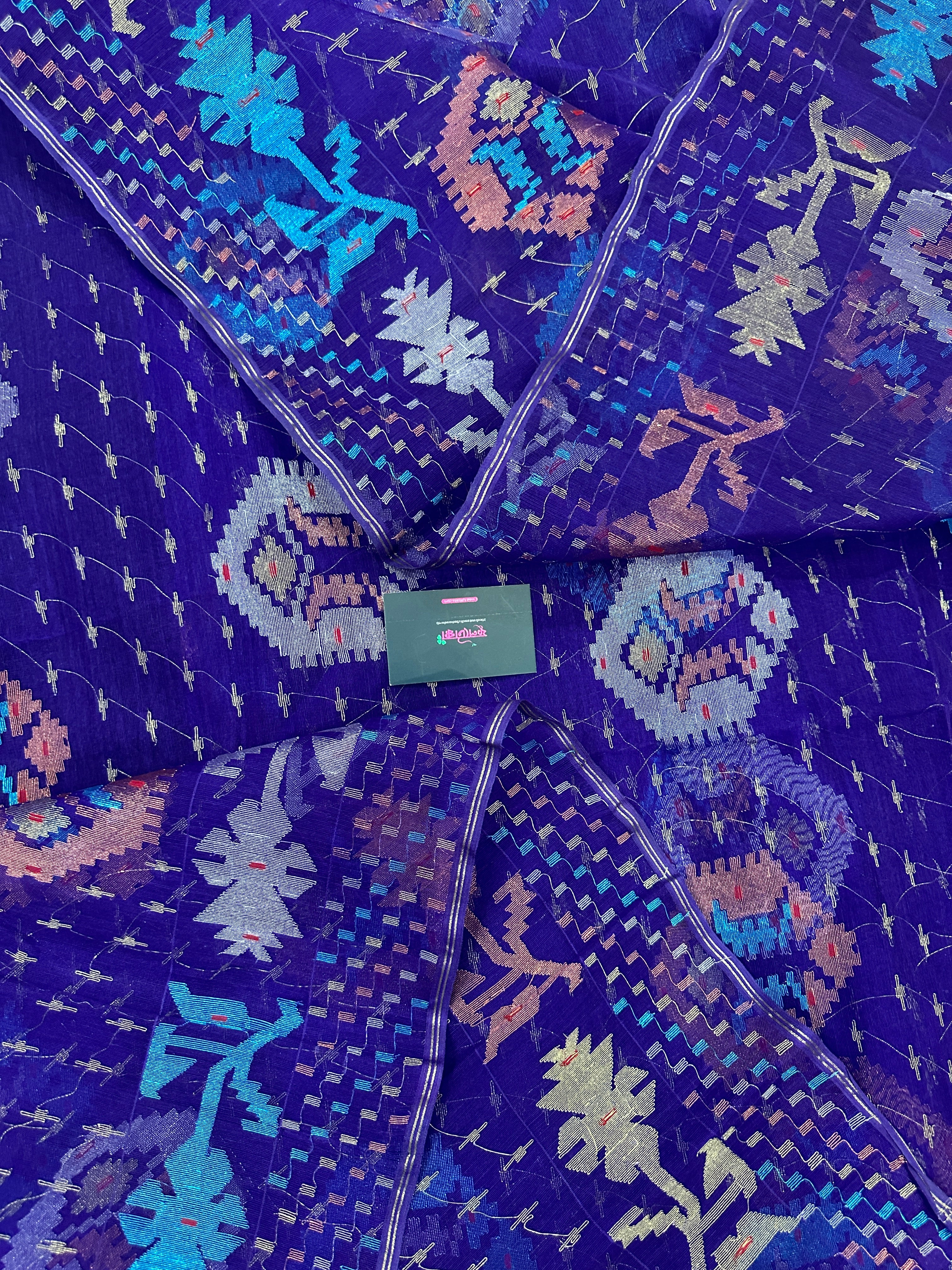 Dual Toned Purple Jamdani Saree With Golden Silver & Copper Jori Work.