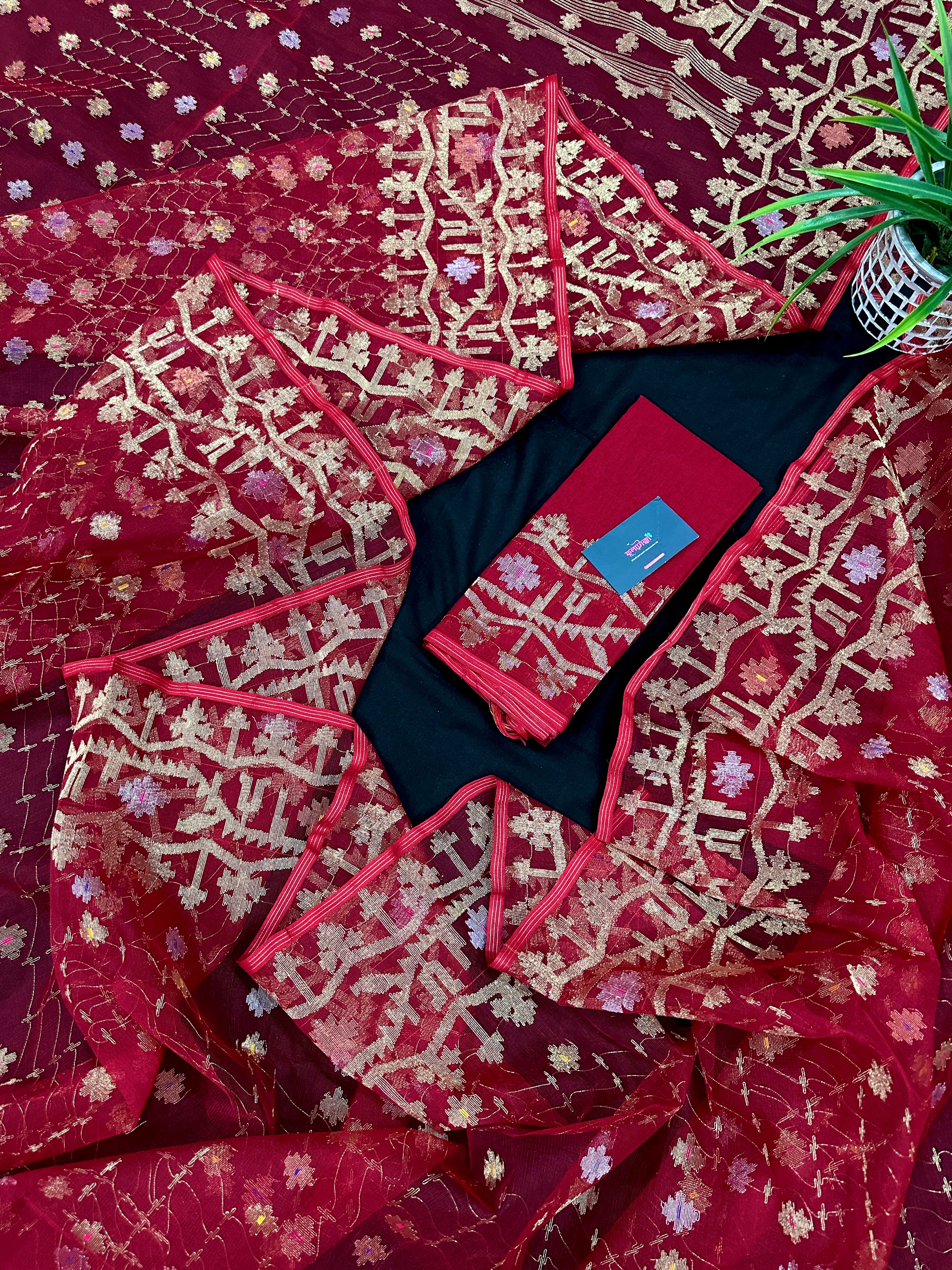 Reddish Maroon Bridal Exclusive dhakai jamdani saree with all over golden jori work soft count.