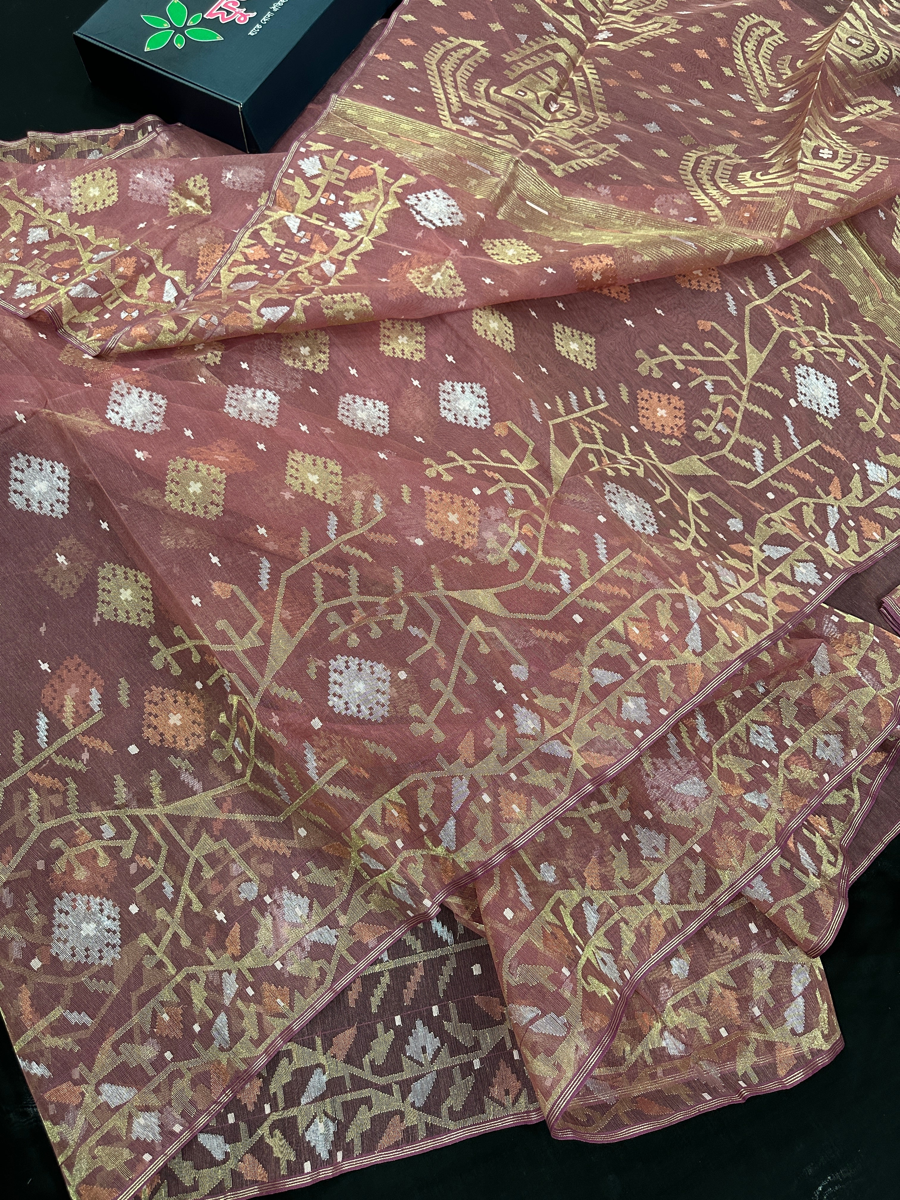 Nude Onion Exclusive Dhakai Jamdani saree with golden silver & copper jori work.