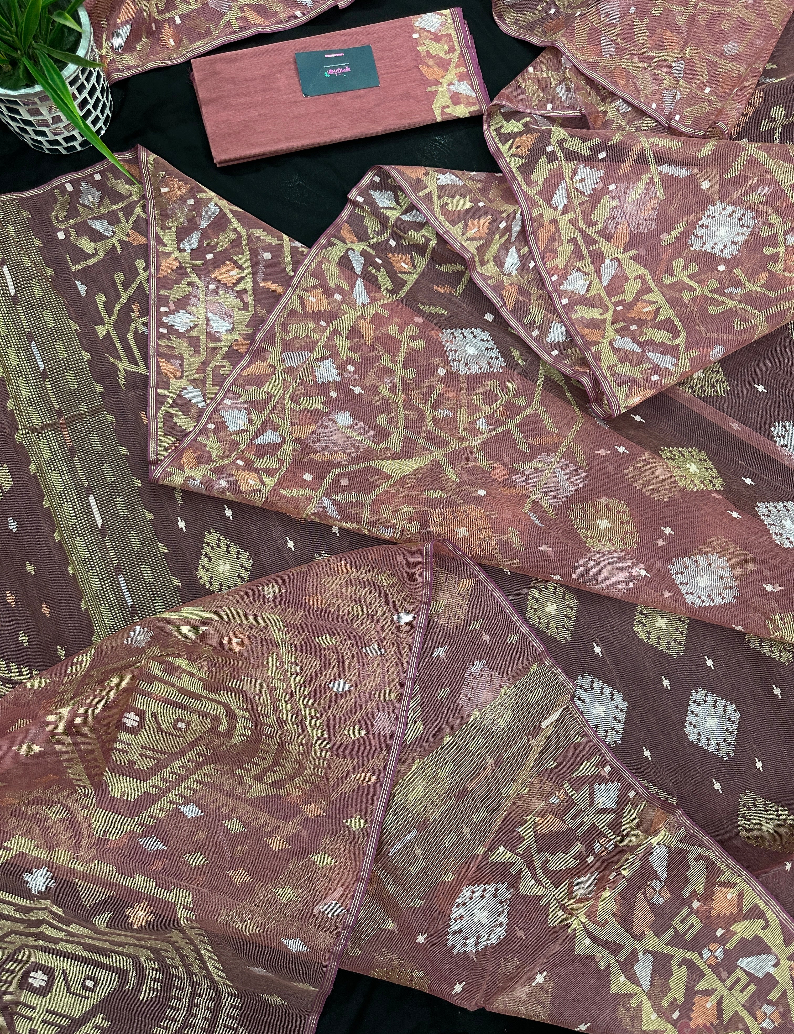 Nude Onion Exclusive Dhakai Jamdani saree with golden silver & copper jori work.