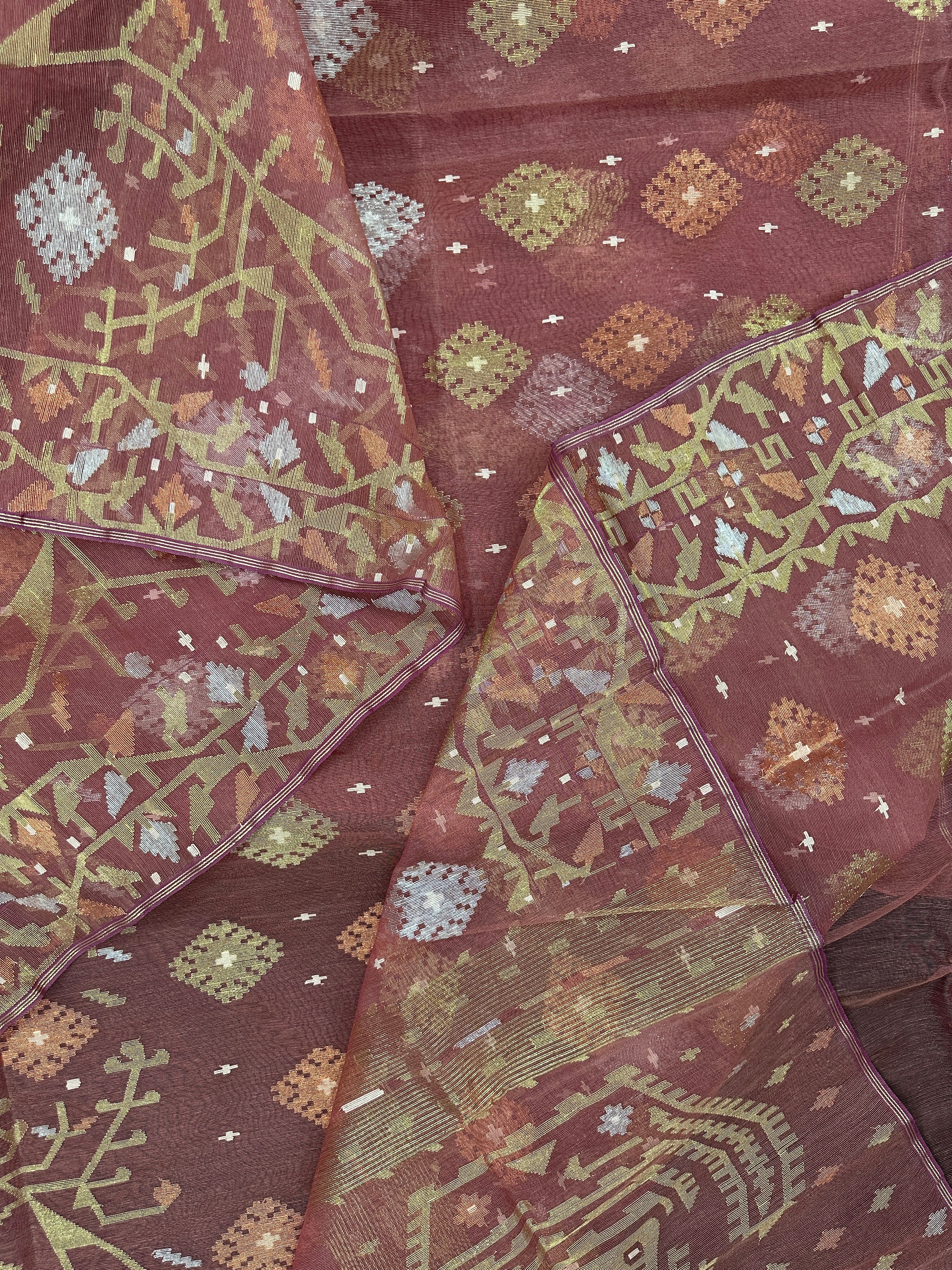 Nude Onion Exclusive Dhakai Jamdani saree with golden silver & copper jori work.