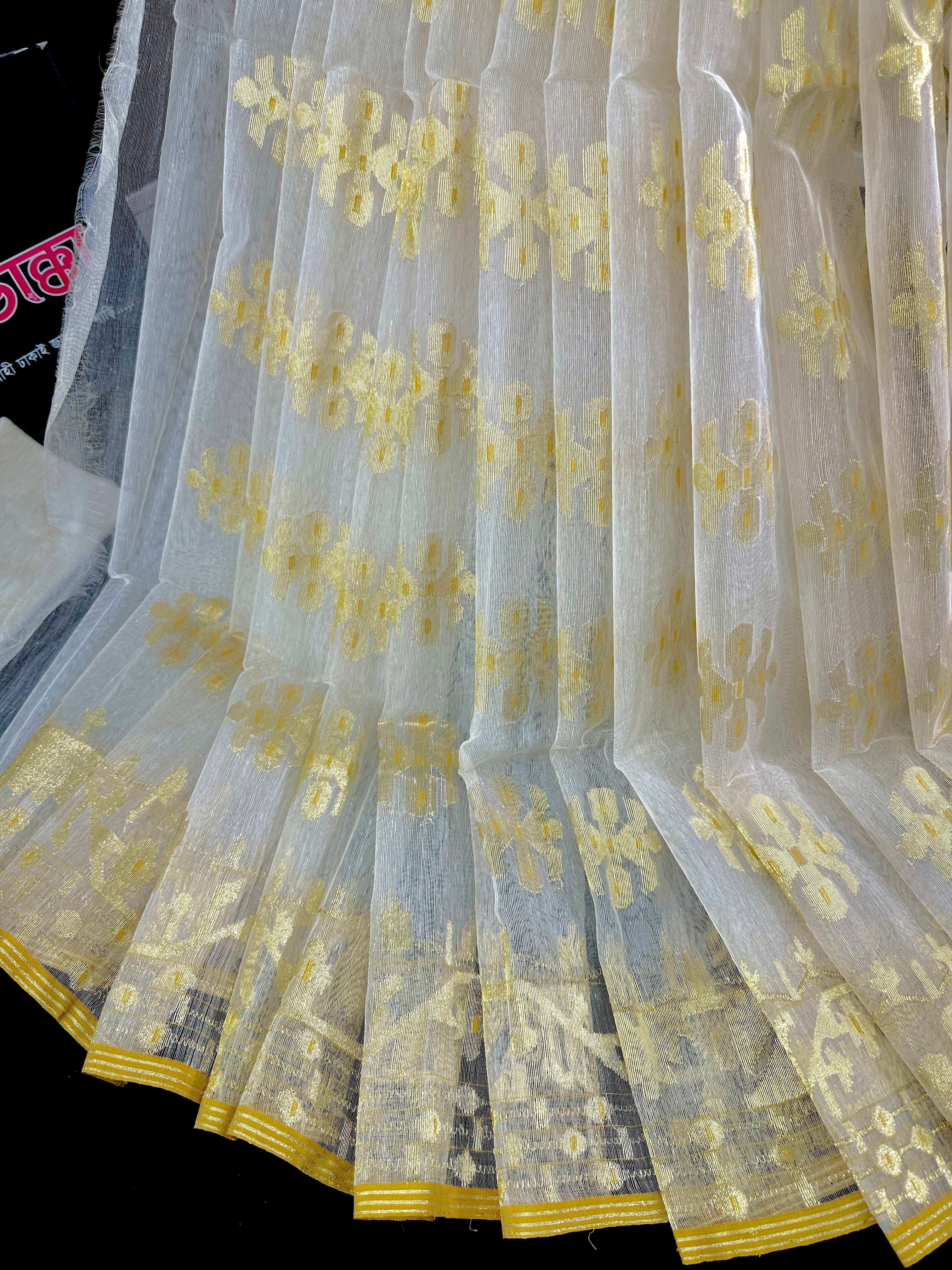 Creamy white halfsilk jamdani saree with golden jori work and blouse piece