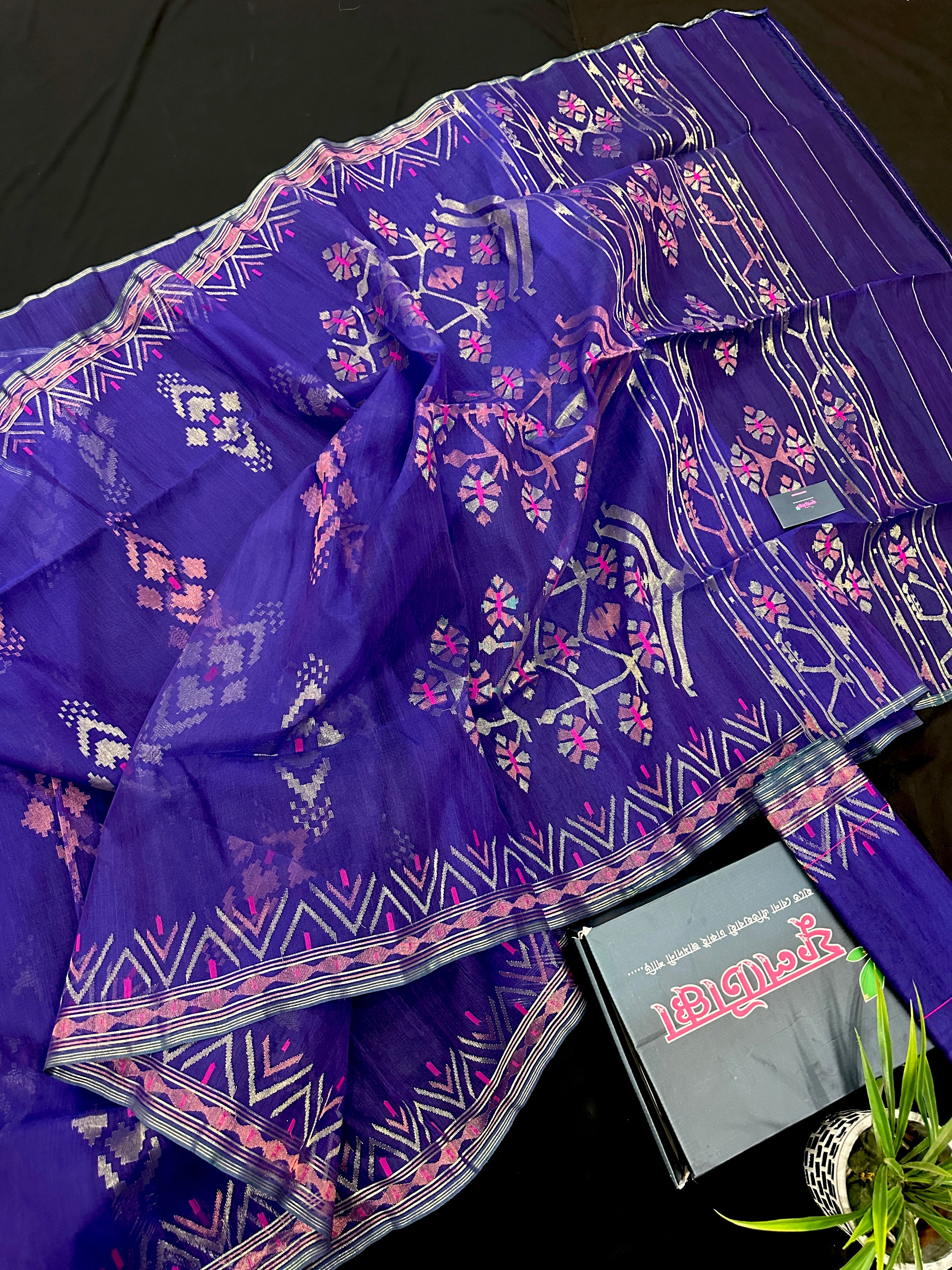 Purple exclusive jamdani saree with golden silver and copper jori work.