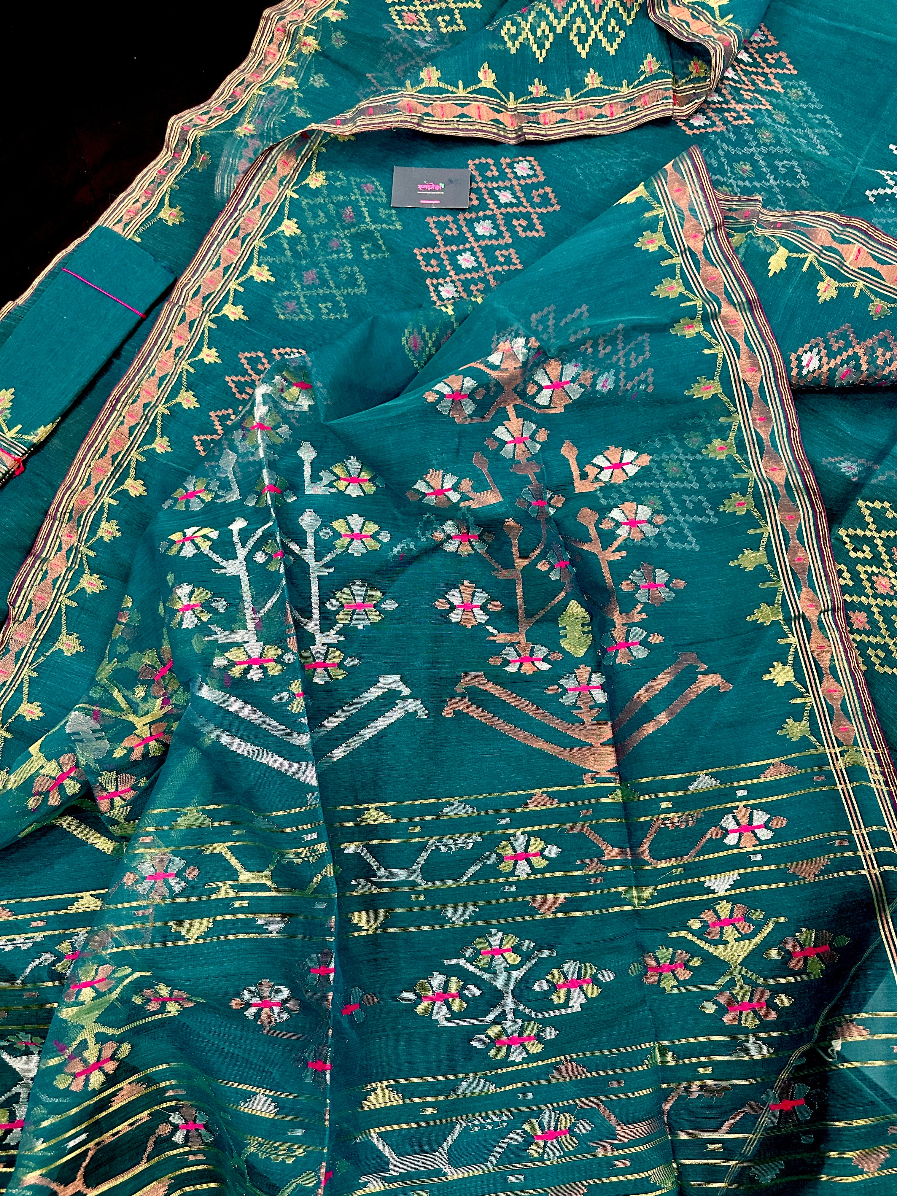 Sea green jamdani saree with golden silver & copper jori work soft count.