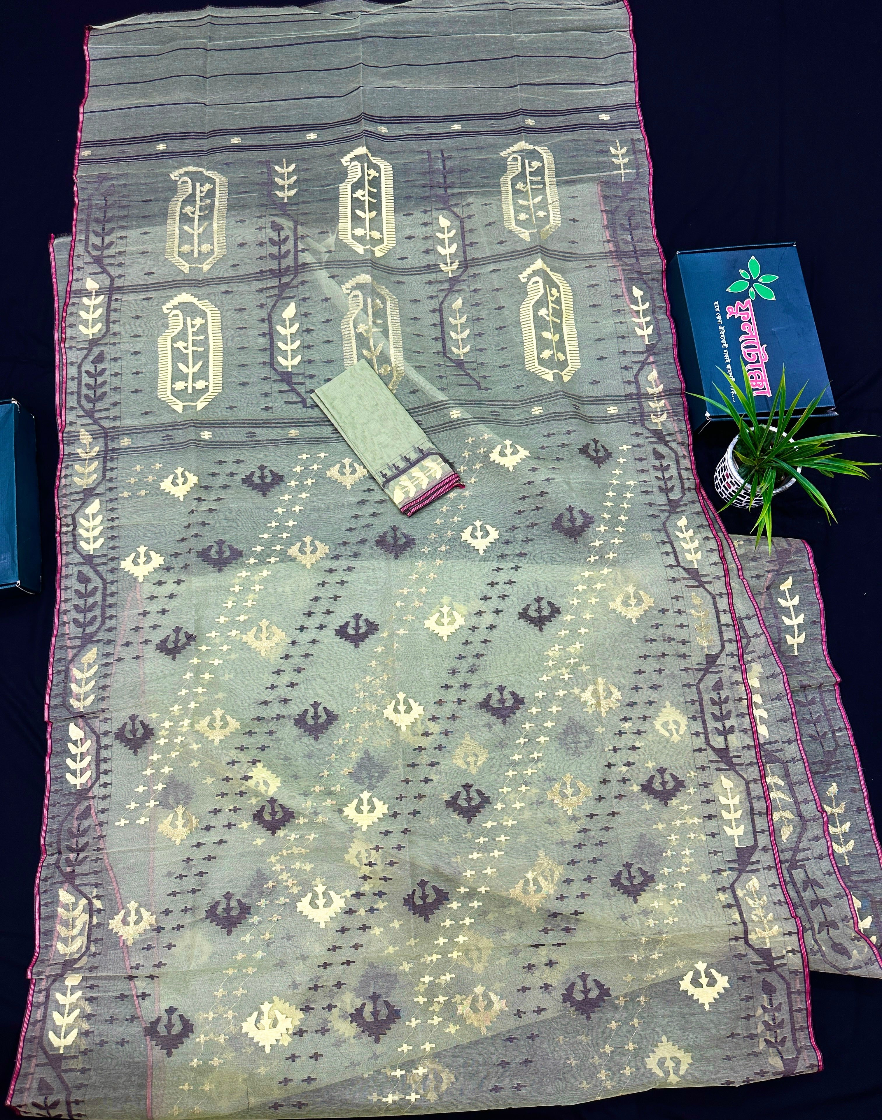 Pear green type Lite mint jamdani saree with threads work.