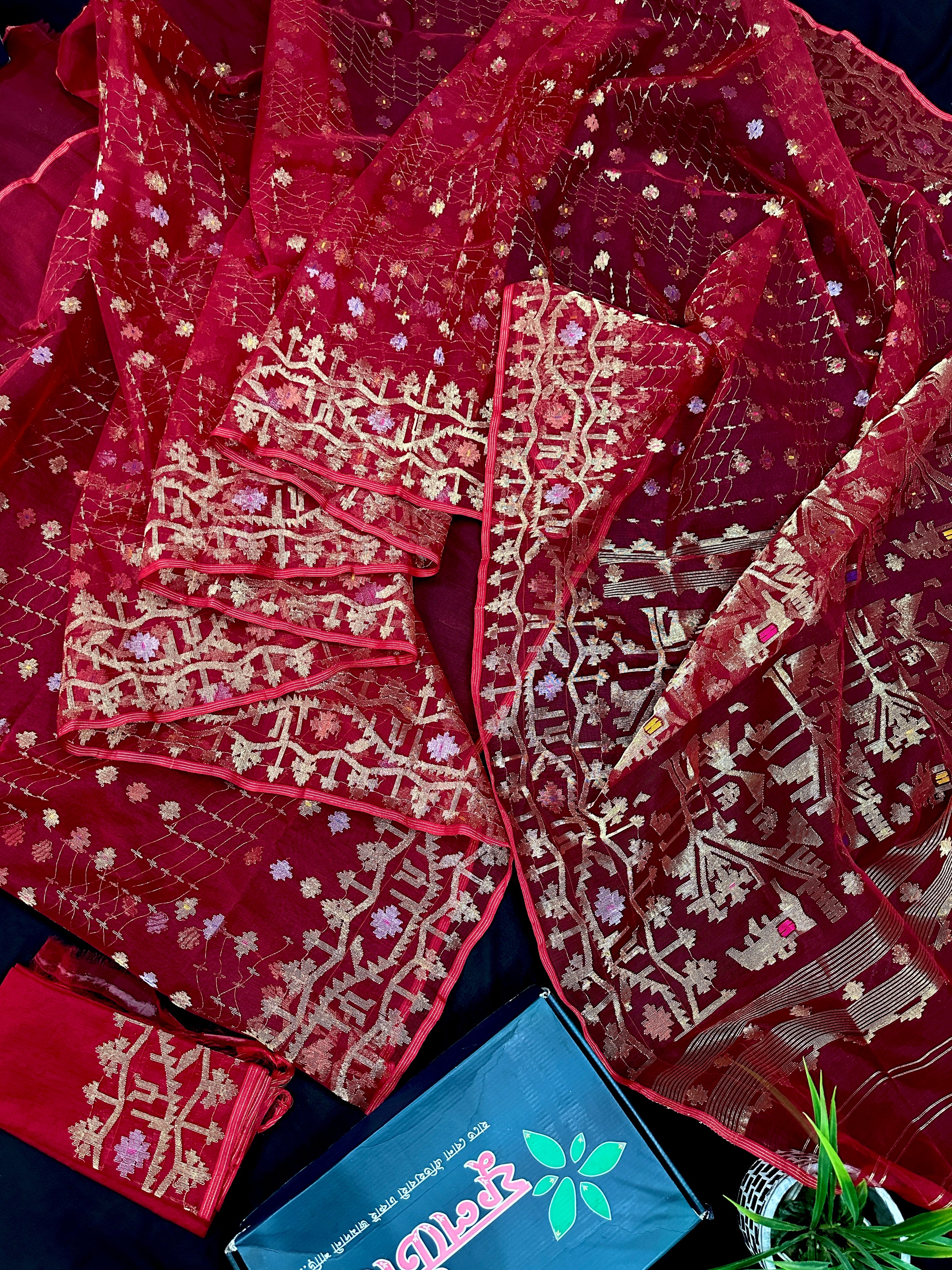 Reddish Maroon Bridal Exclusive dhakai jamdani saree with all over golden jori work soft count.