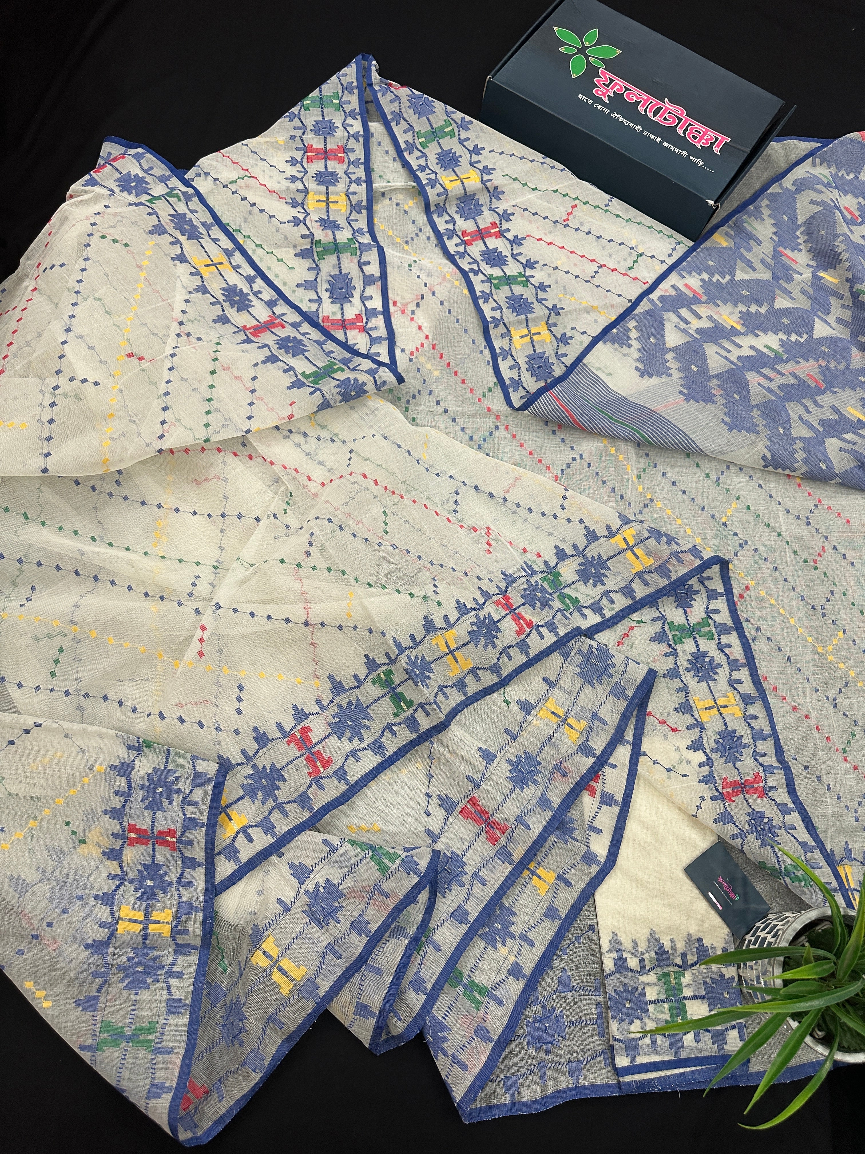 White cotton jamdani saree with blue yellow red green threads work& blouse piece.
