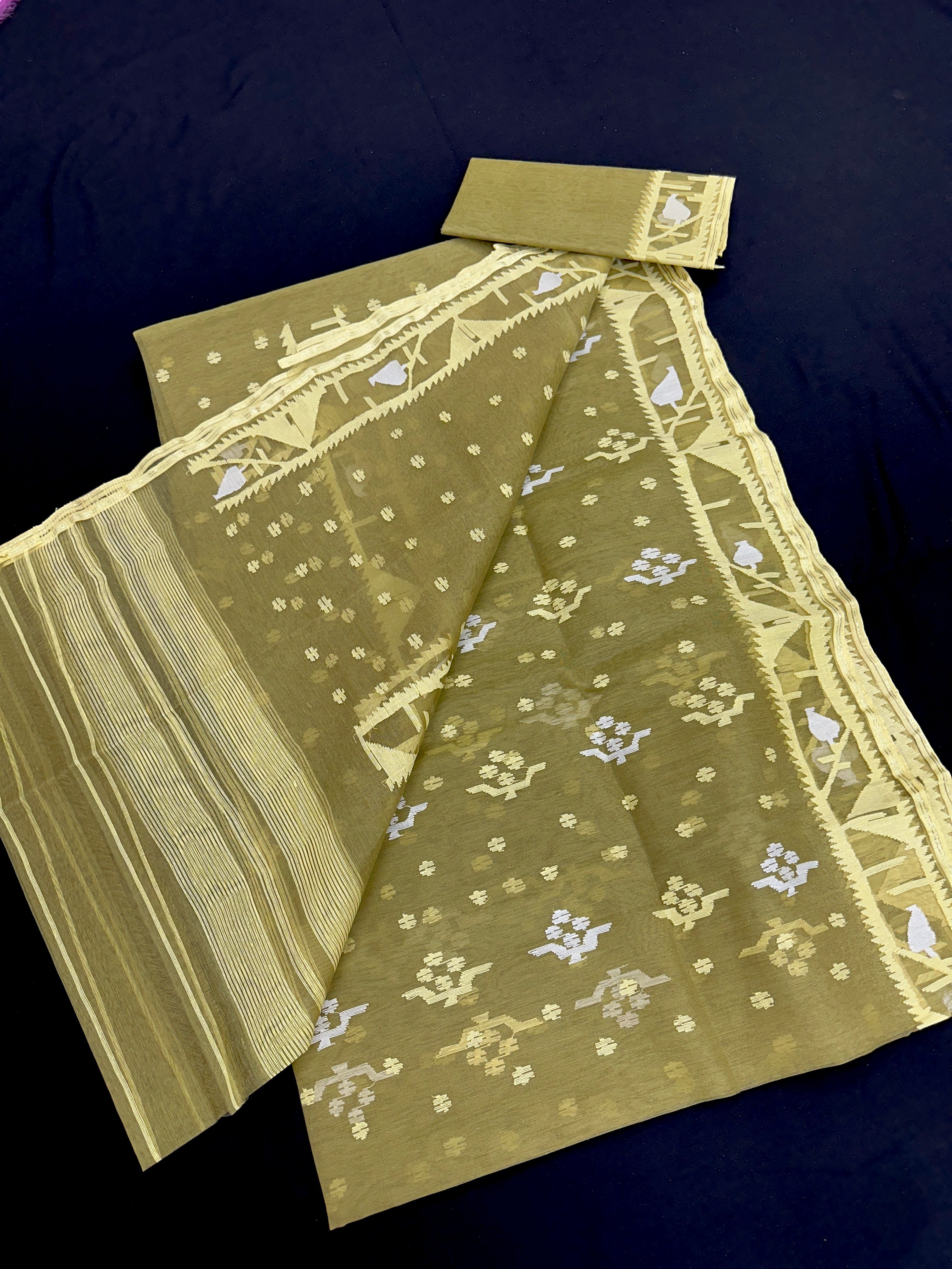 Olive colour halfsilk jamdani saree with silver jori work and self threads work
