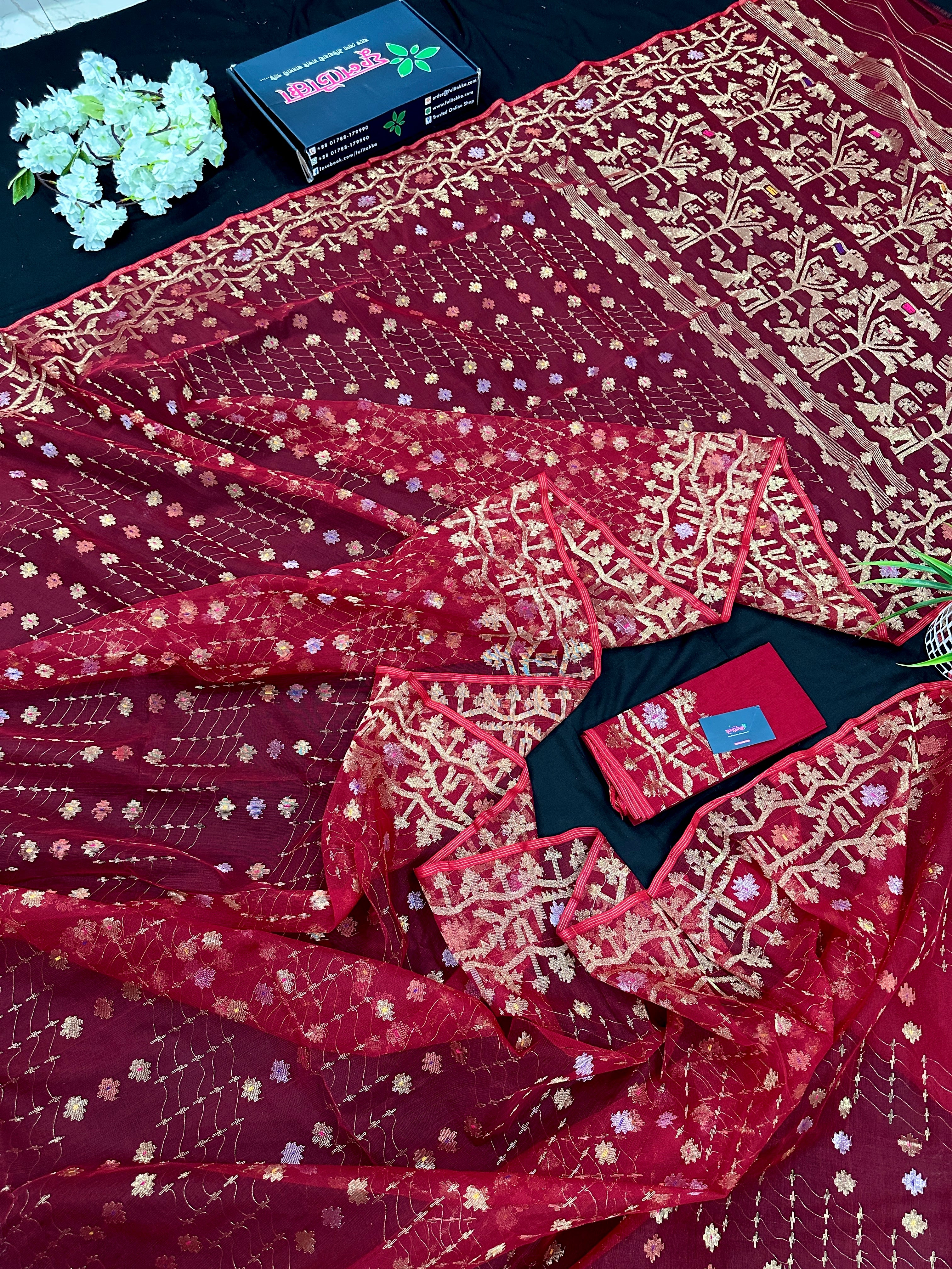 Reddish Maroon Bridal Exclusive dhakai jamdani saree with all over golden jori work soft count.