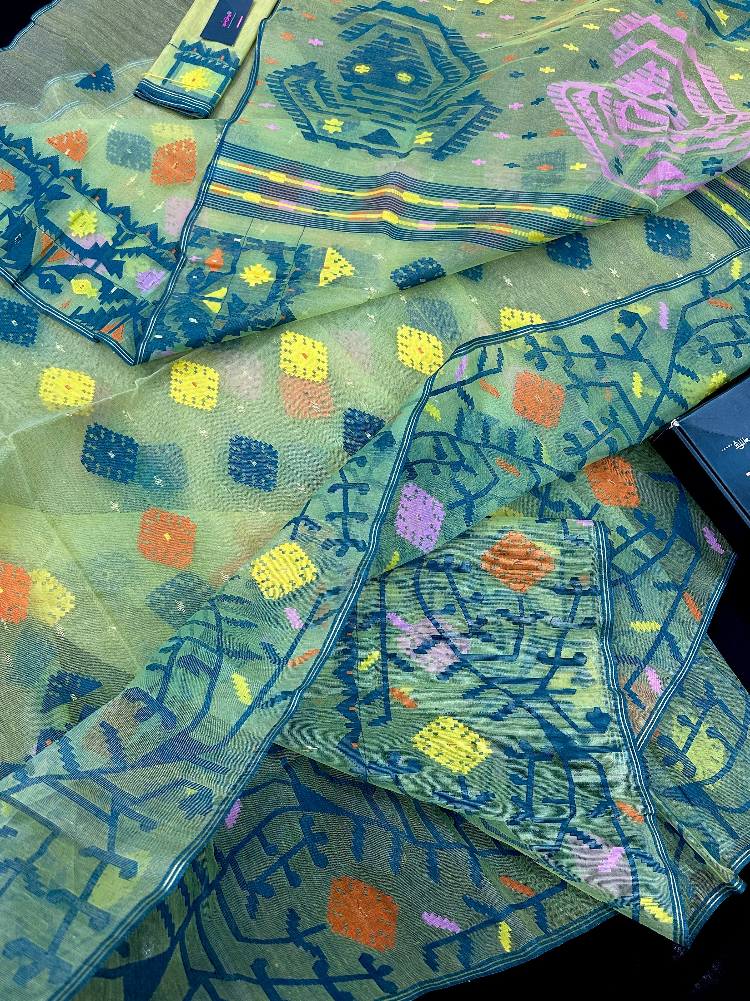 Yellow Exclusive dhakai jamdani saree with all over multi colour threads & flower work soft count.