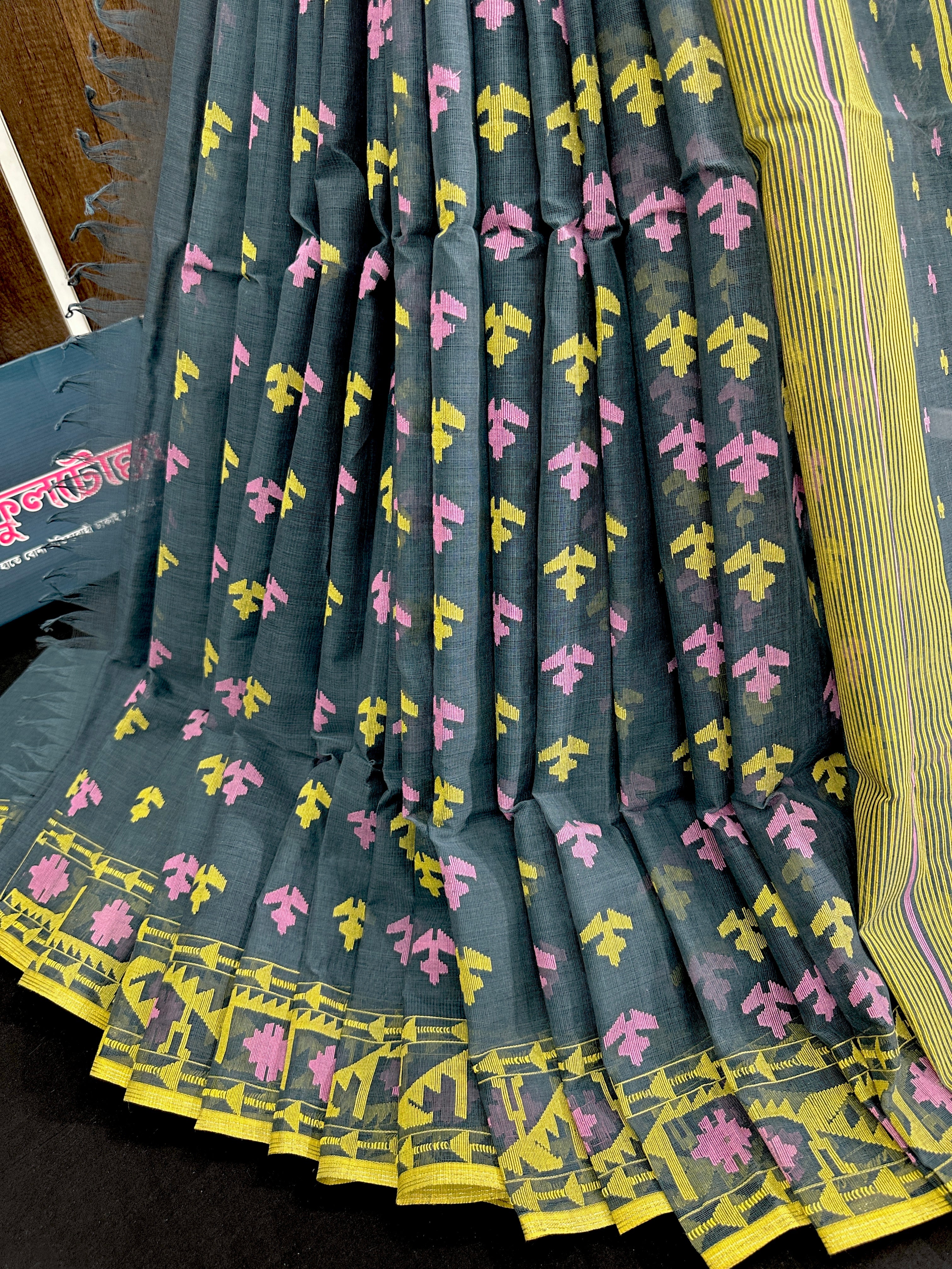 Ash blue cotton jamdani saree with yellow pink threads work