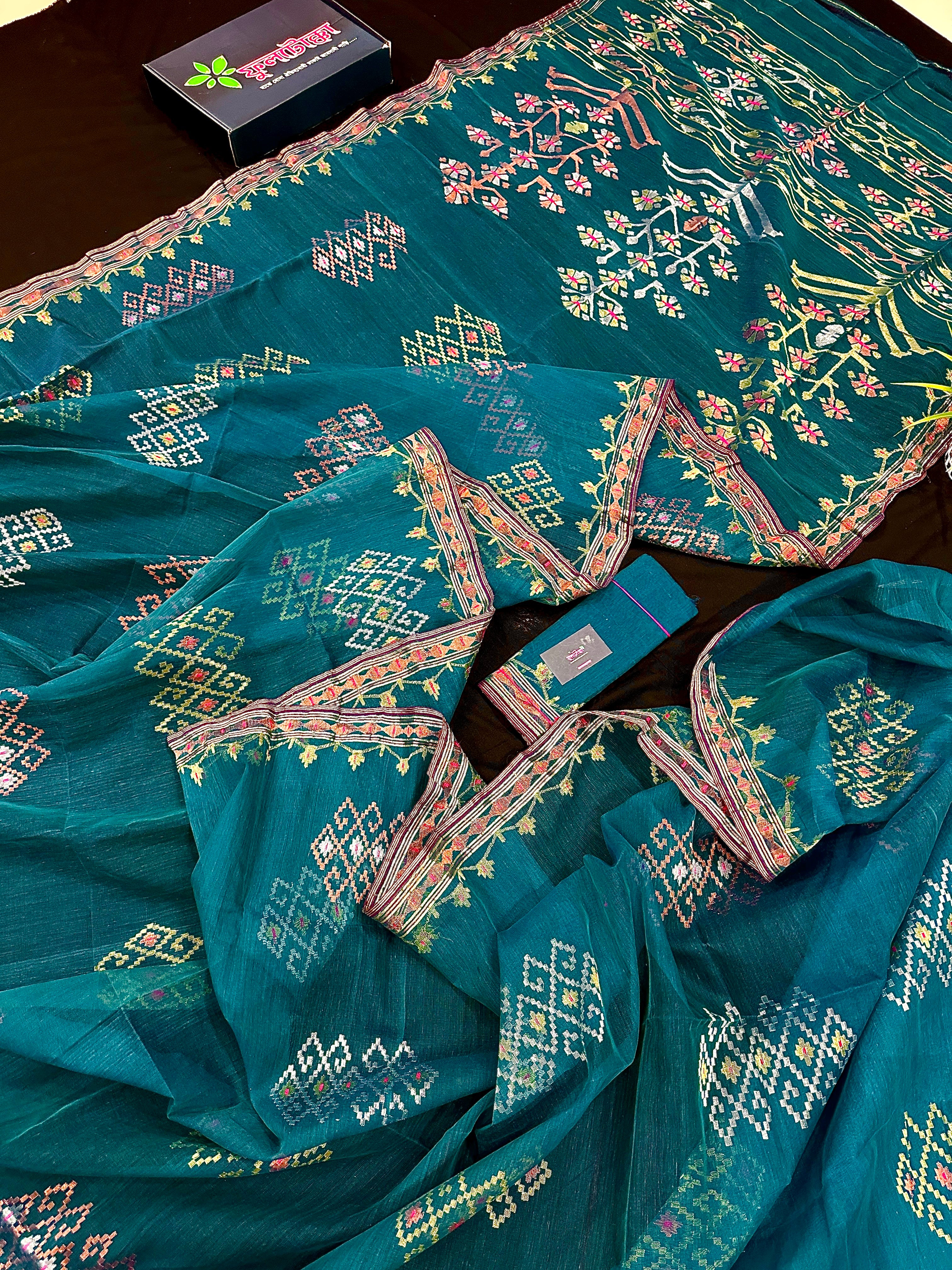 Sea green jamdani saree with golden silver & copper jori work soft count.