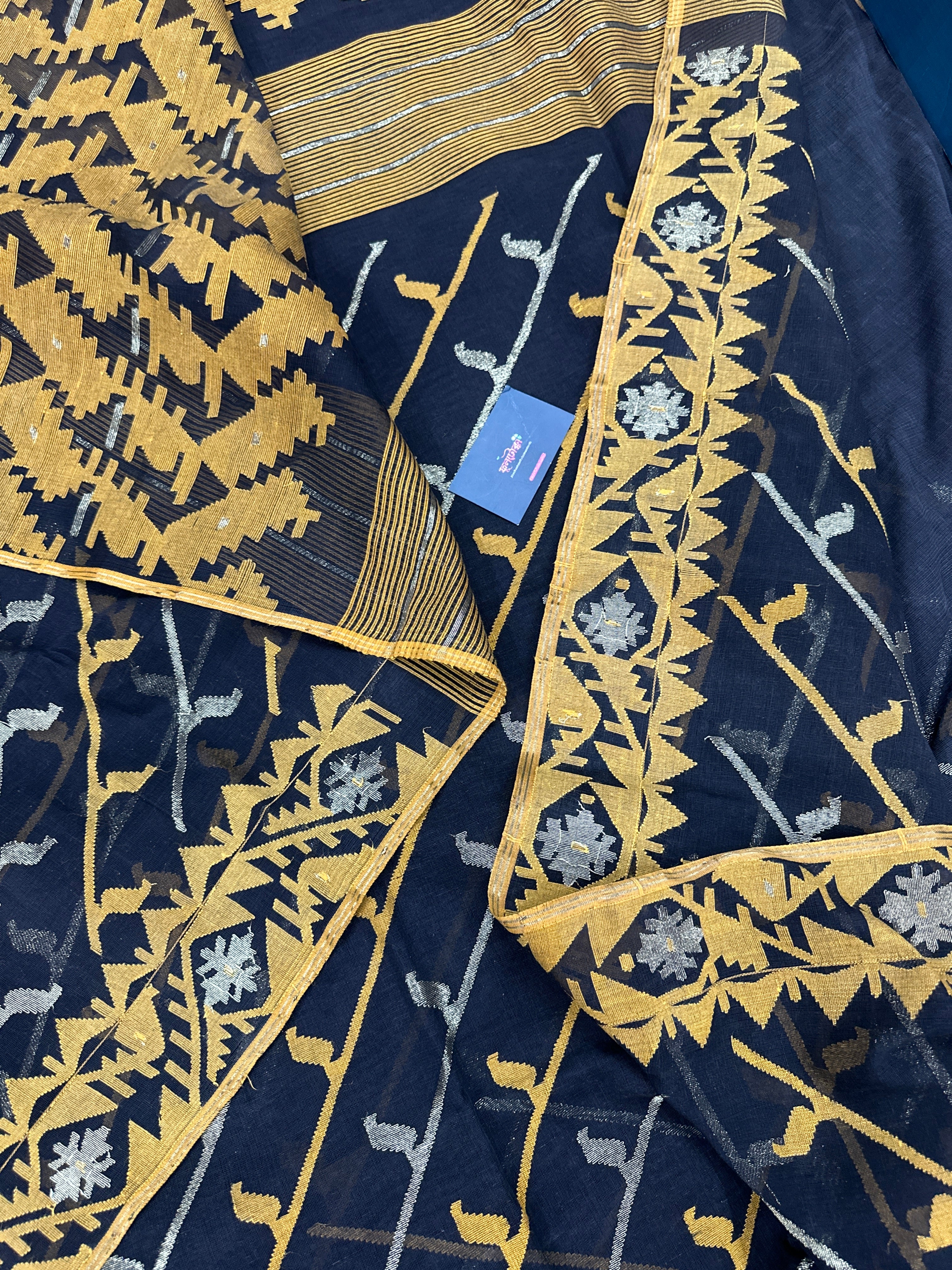 Black cotton jamdani saree with yellow threads work and Silver jori work & blouse piece.