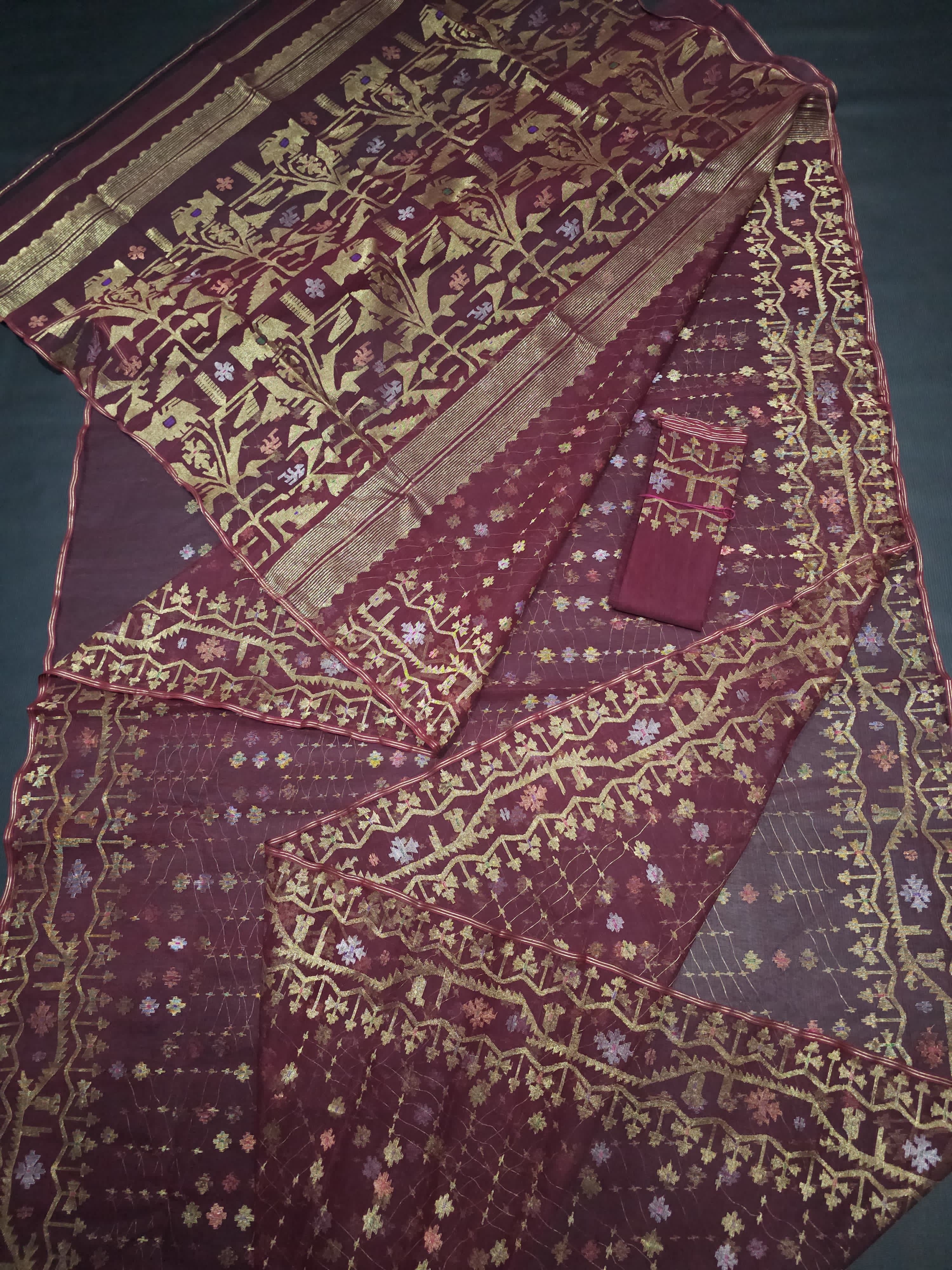 Maroon halfsilk jamdani saree with golden jori work