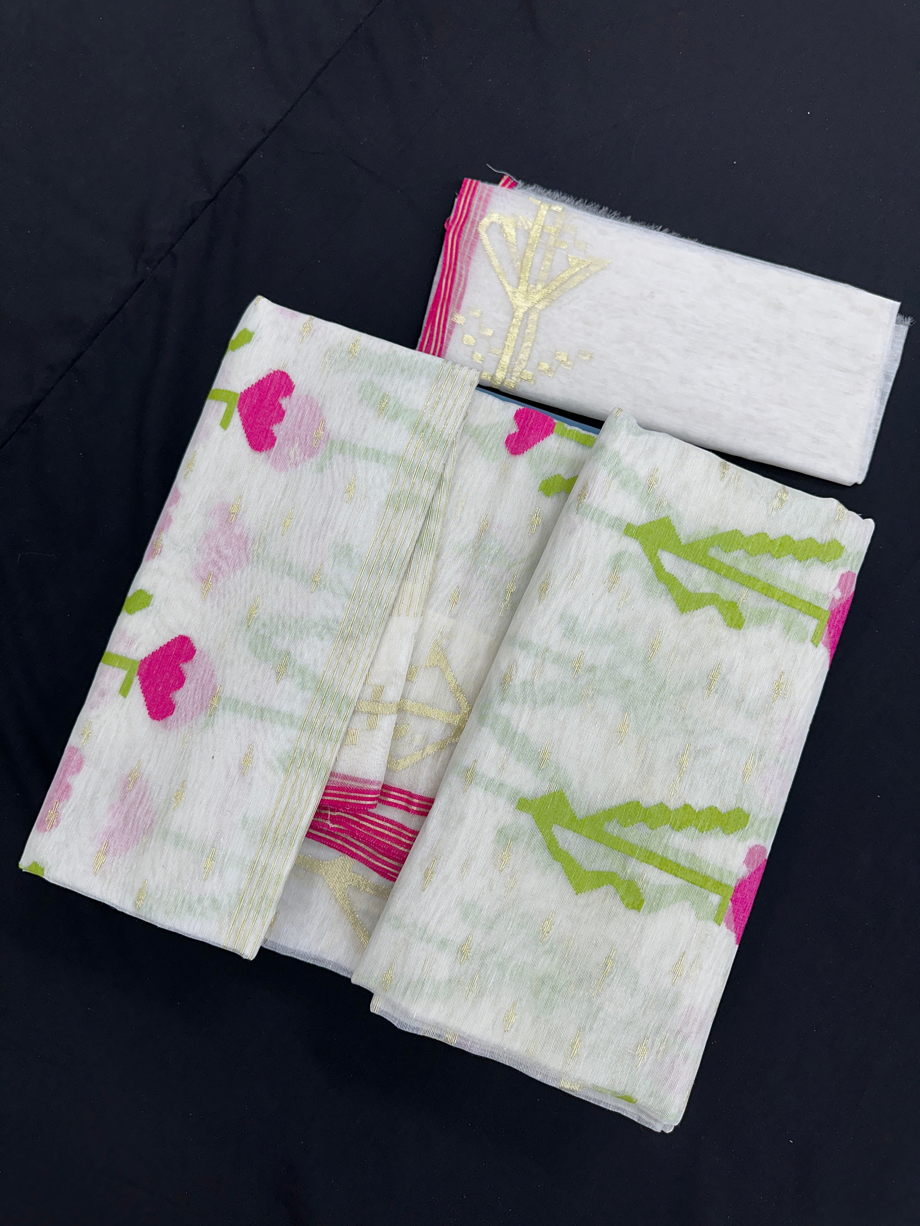 Elegant White Jamdani saree.