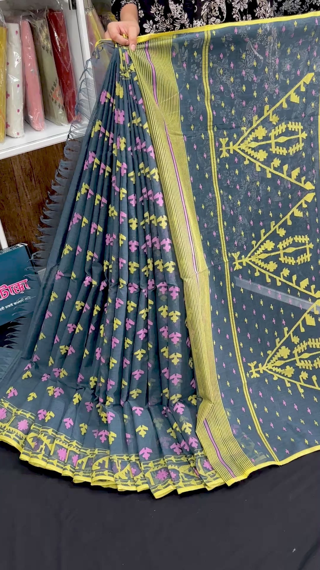 Ash blue cotton jamdani saree with yellow pink threads work