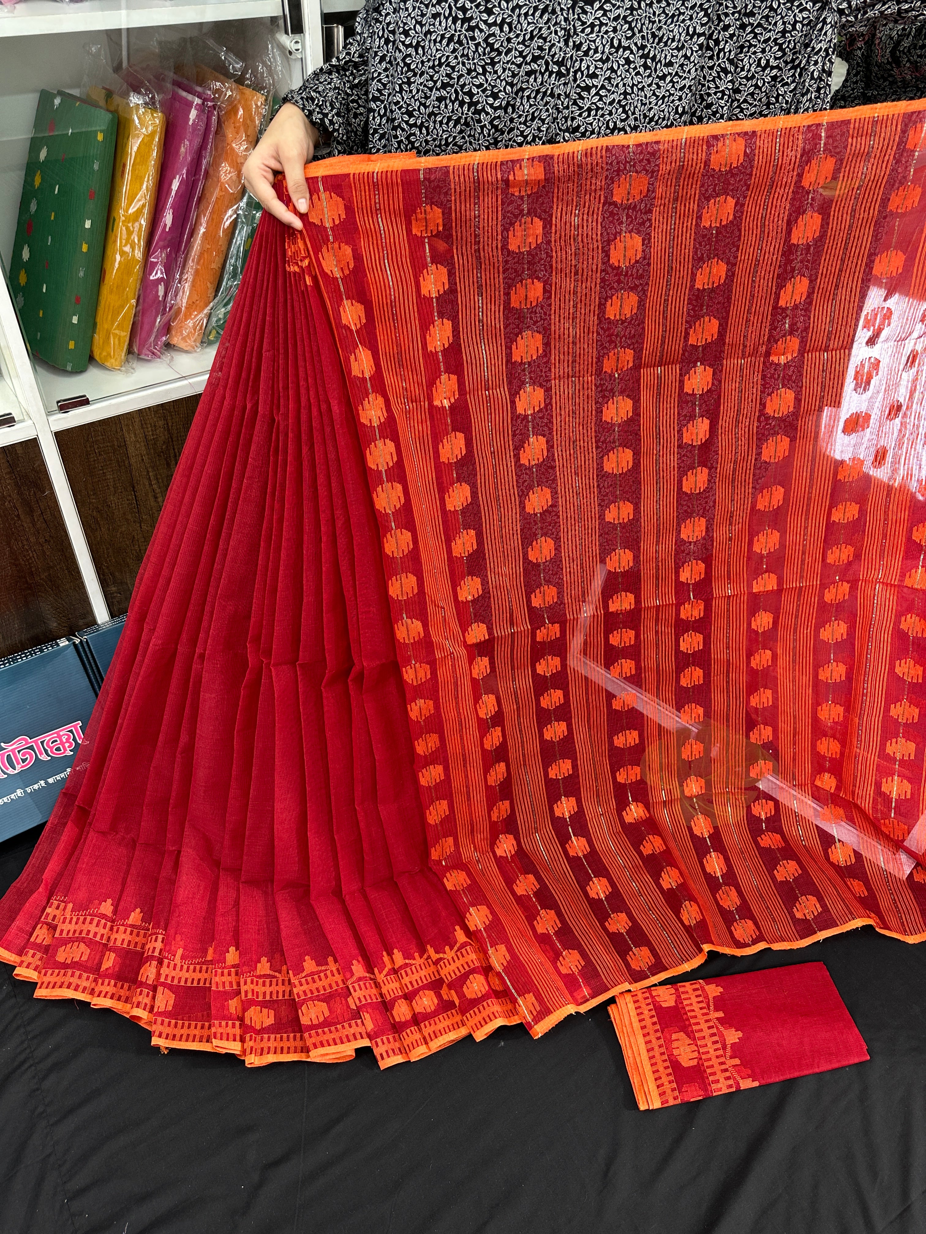 Red cotton jamdani saree with orange threads work