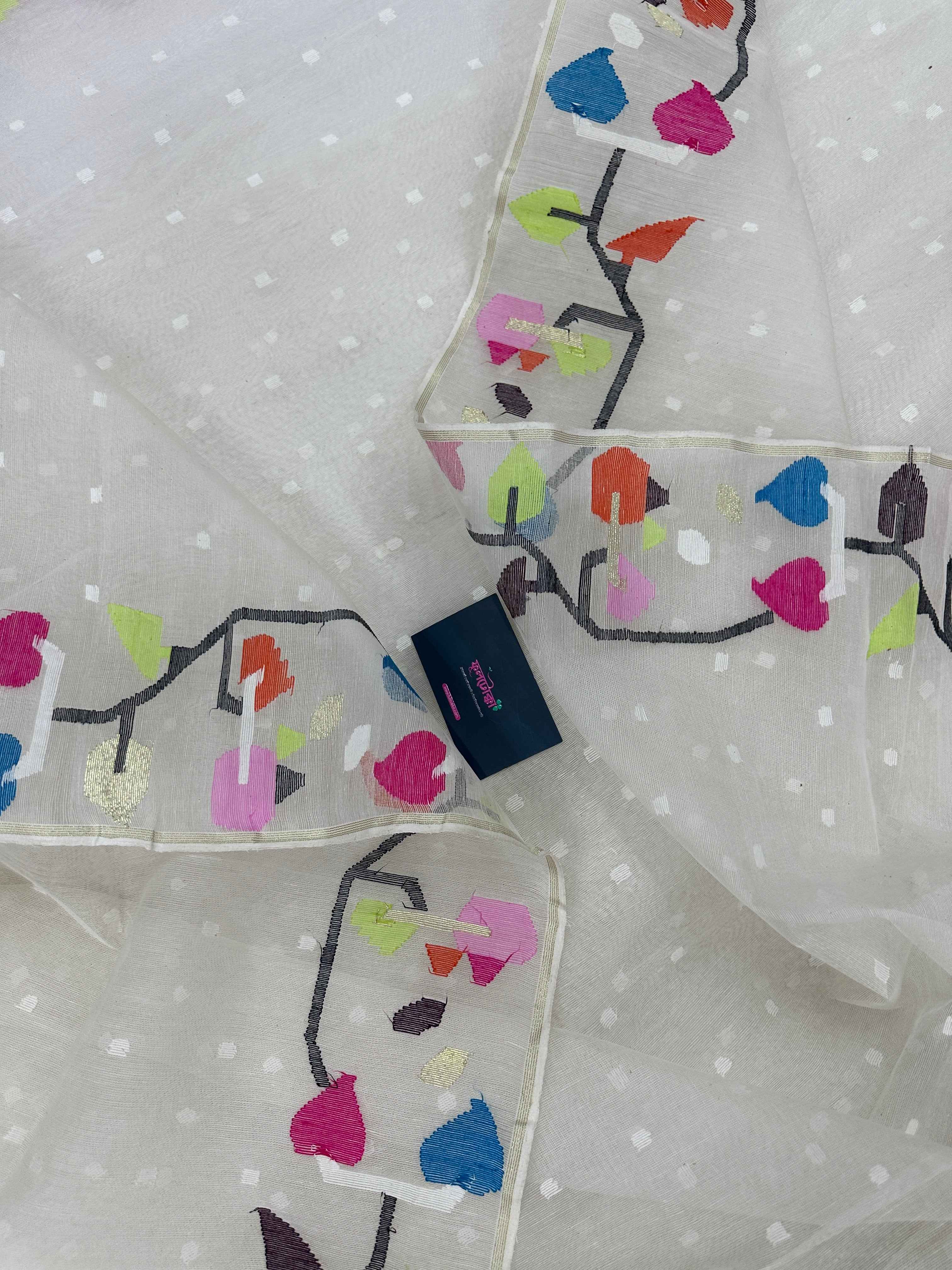 White Jamdani Saree With Multiple Threads Work.