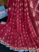 Maroon cotton jamdani saree with golden jori work and blouse piece.