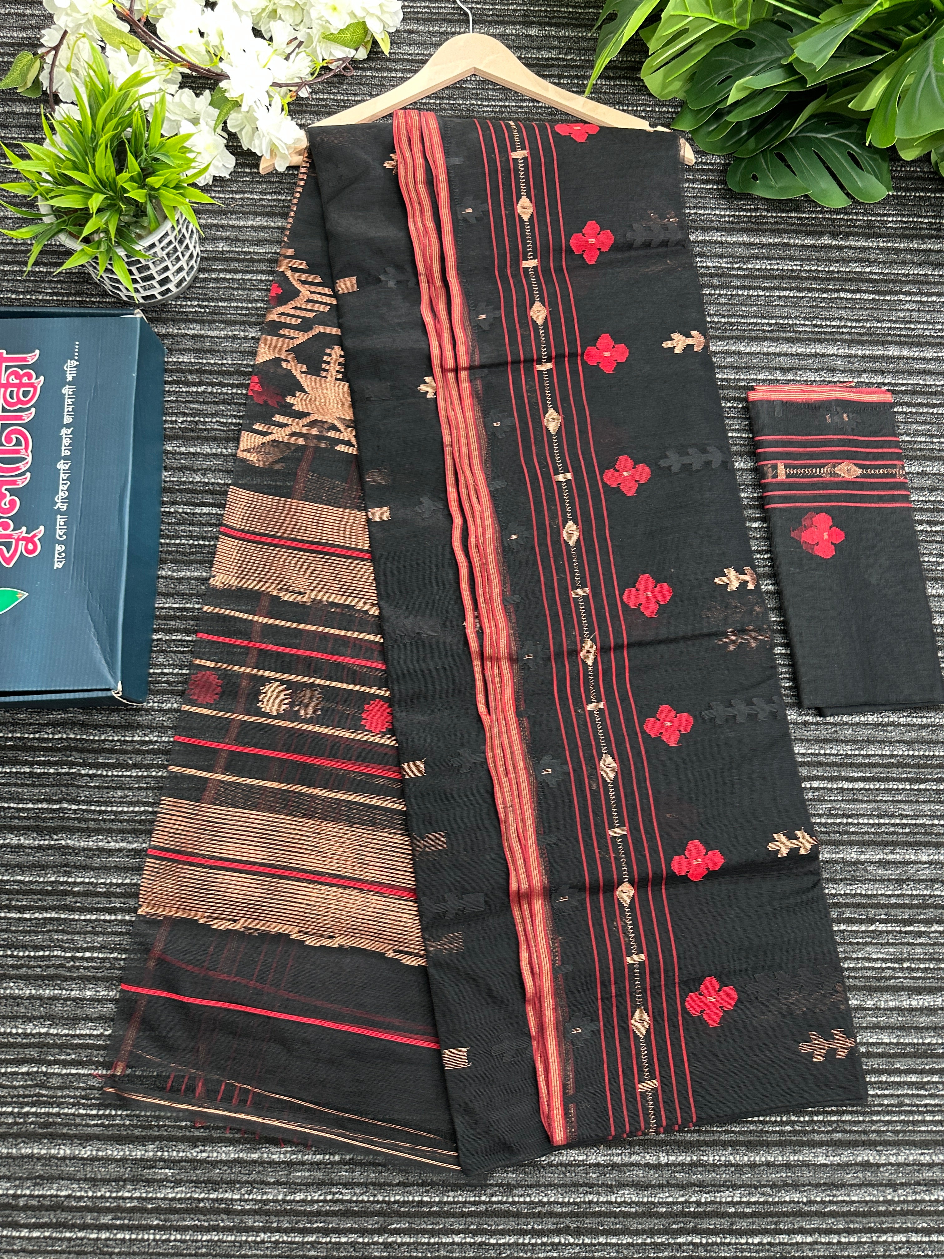 Black halfsilk jamdani saree with red paar and copper jori work