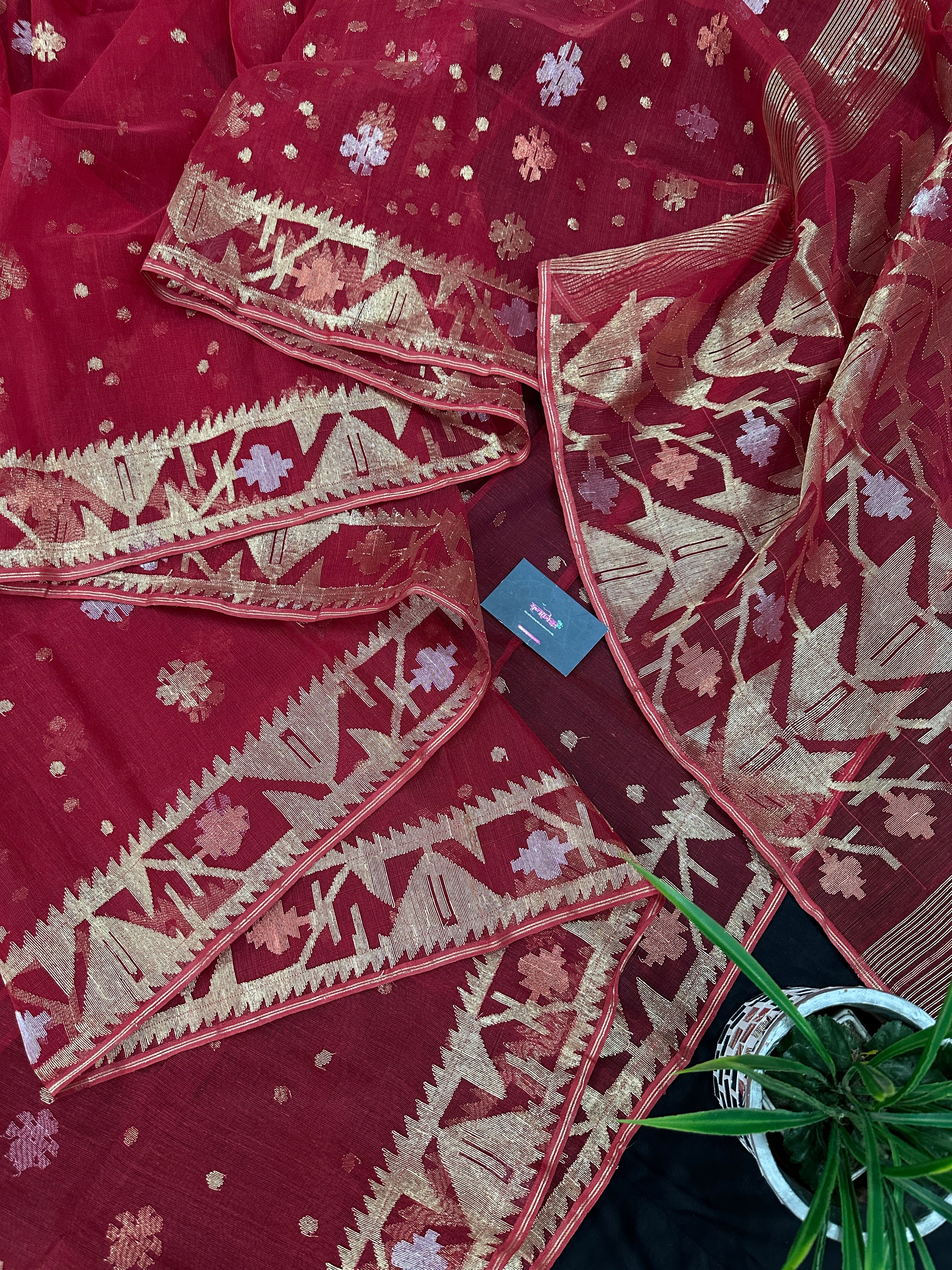Red jamdani saree with golden jori all over work with blouse piece.
