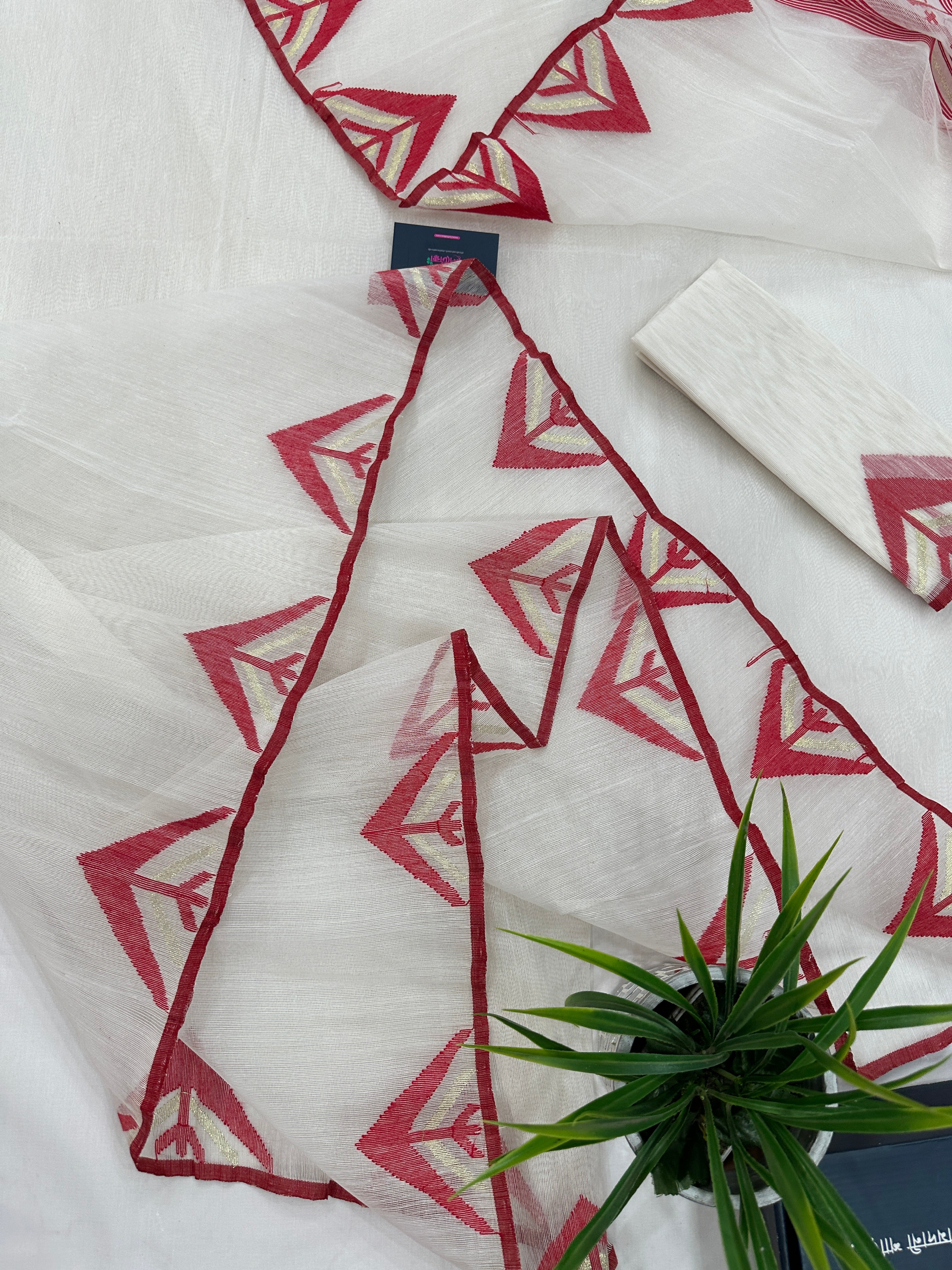 White Jamdani Saree With Red Paar.