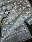 Ash jamdani saree with pink blue and with threads work and golden jori work.