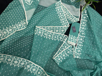 Mint cotton jamdani saree with white threads work all over work and blouse piece.