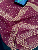Maroon cotton jamdani with yellowish threads work.