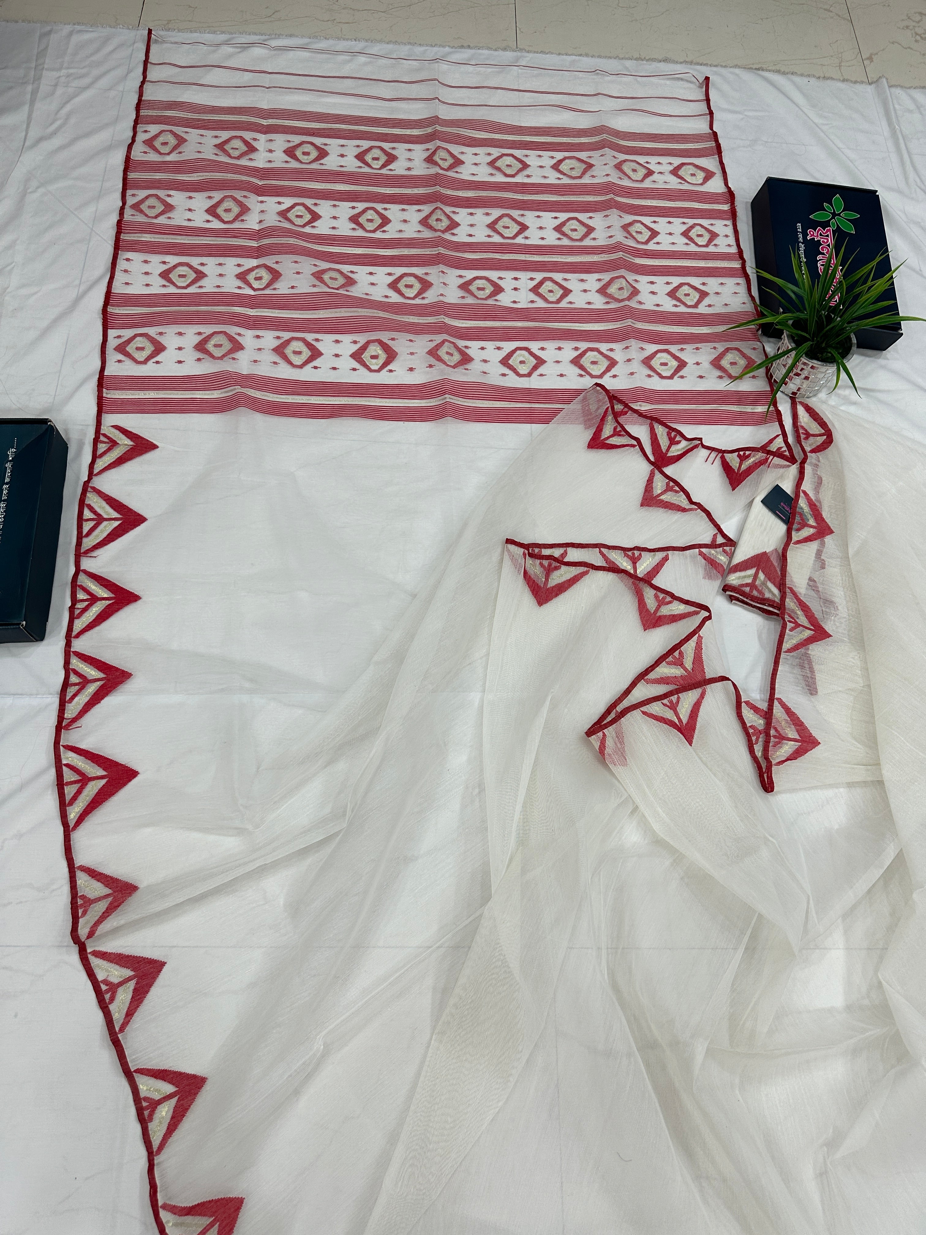 White Jamdani Saree With Red Paar.