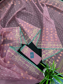 Onion colour jamdani saree with pink meena and green border.