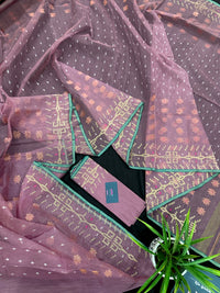 Onion colour jamdani saree with pink meena and green border.