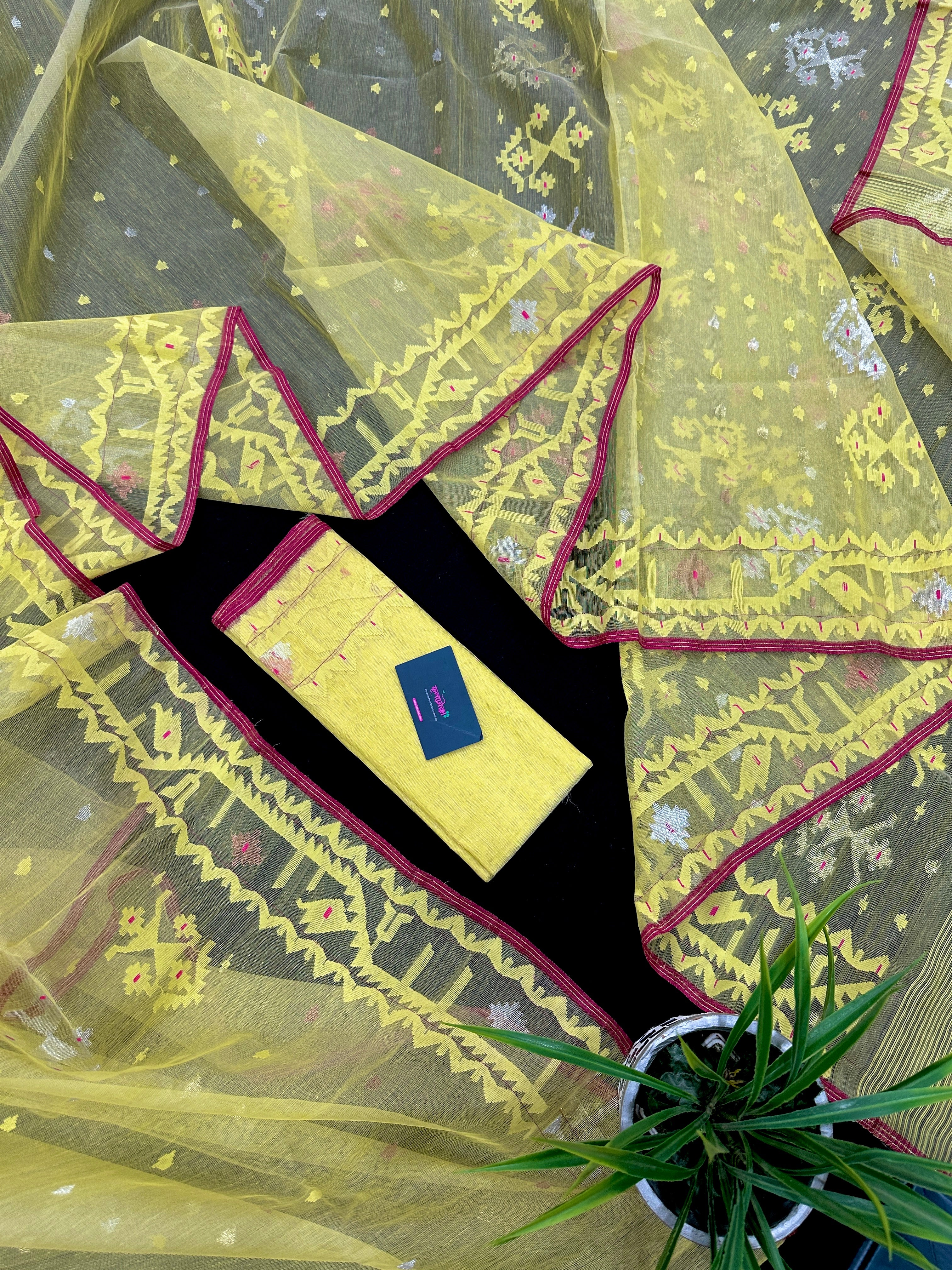 Pastel yellow dhakai jamdani saree with yellow threads silver & copper jori work all over work soft count.