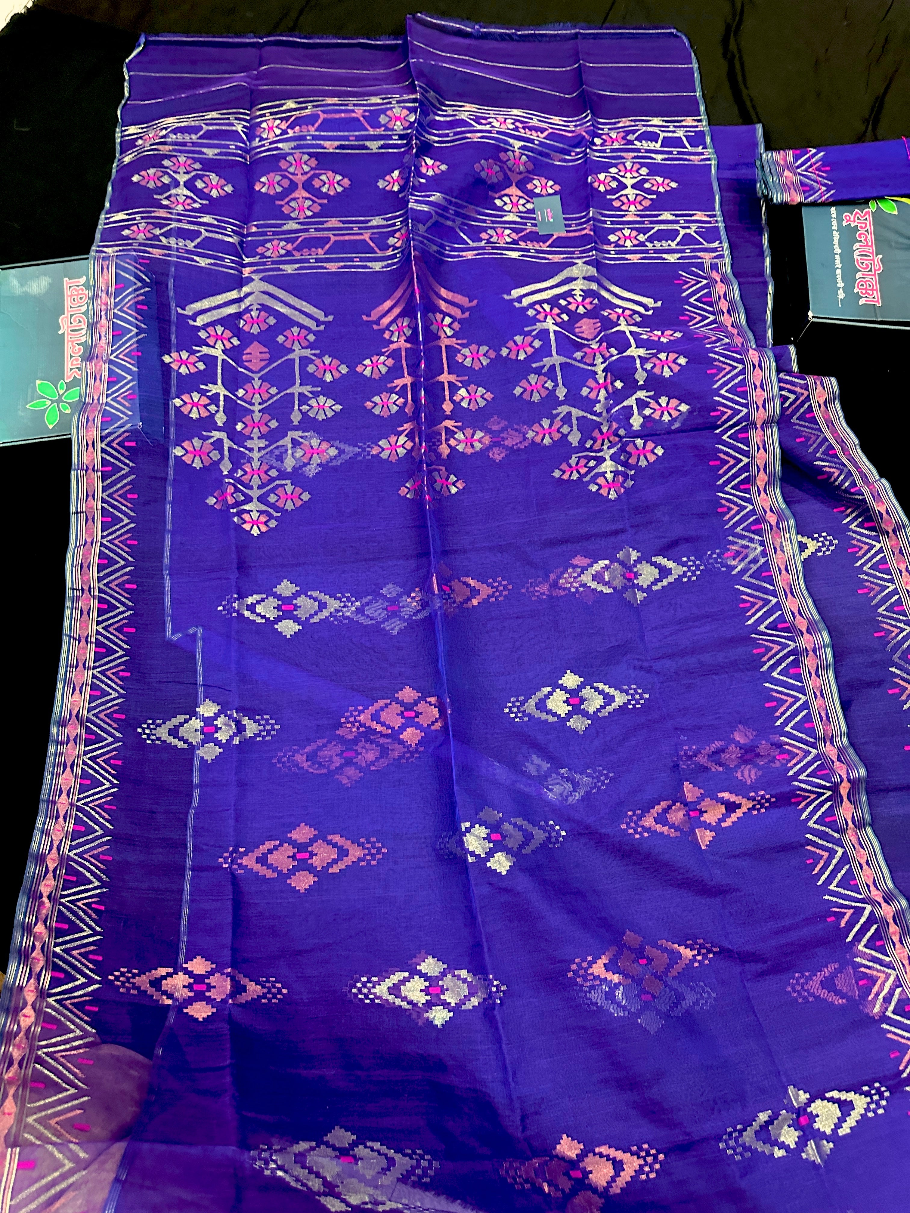 Purple exclusive jamdani saree with golden silver and copper jori work.