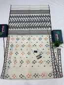 White cotton jamdani saree with orange & black threads work.