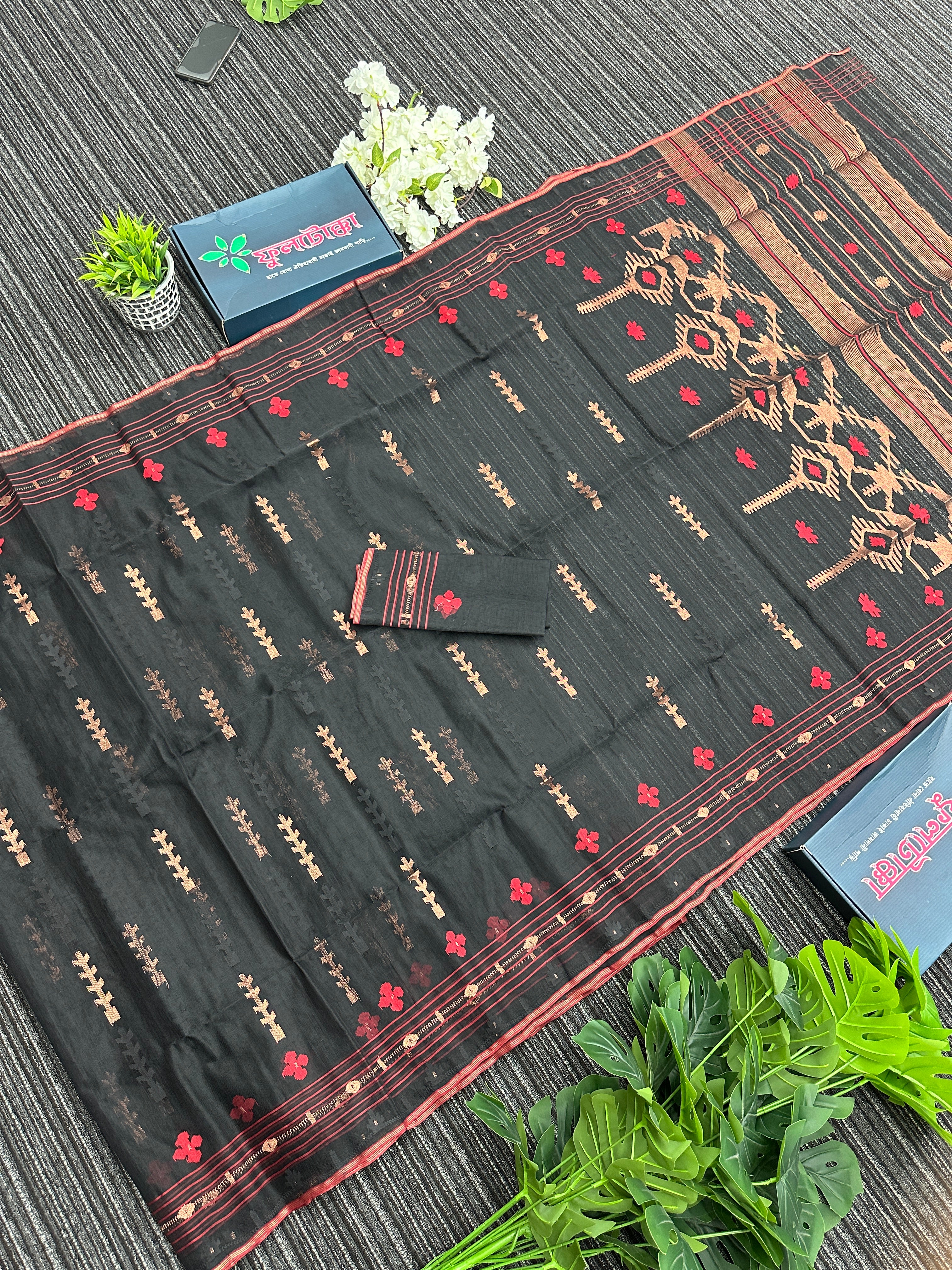 Black halfsilk jamdani saree with red paar and copper jori work