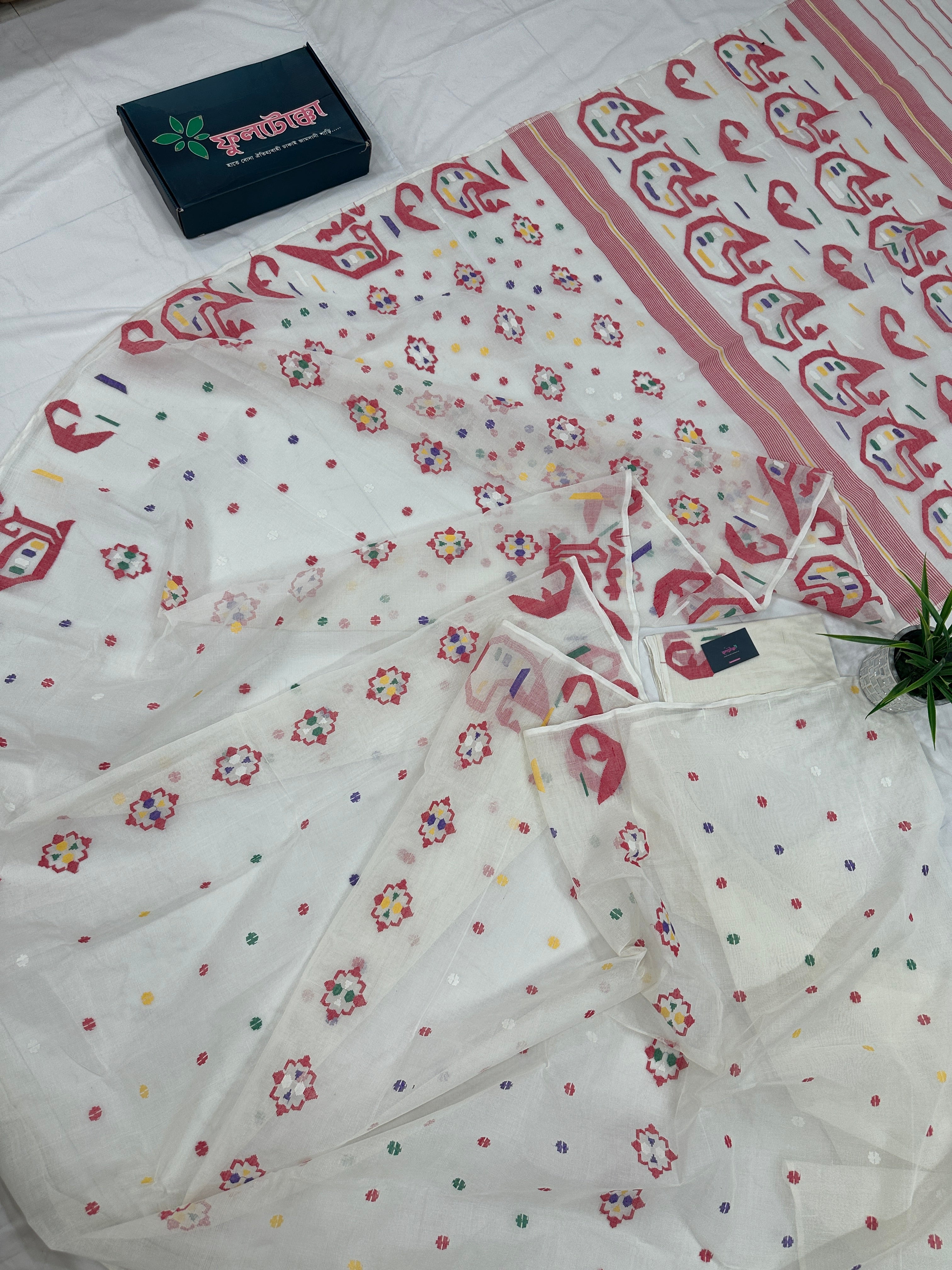 White cotton jamdani saree with multiple colour threads work and blouse piece.