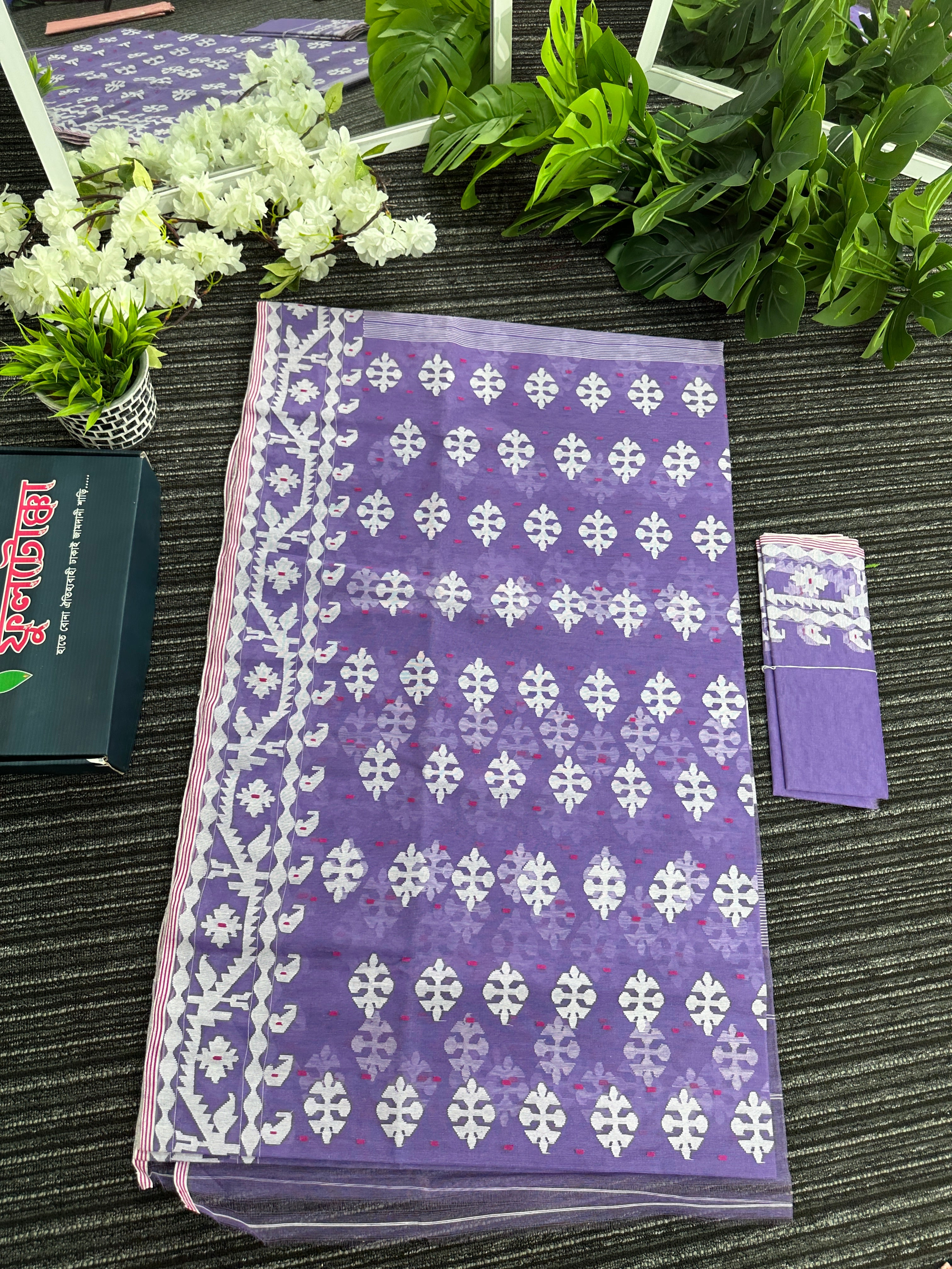 Lavendar halfsilk jamdani saree with white threads work and magenta meena work