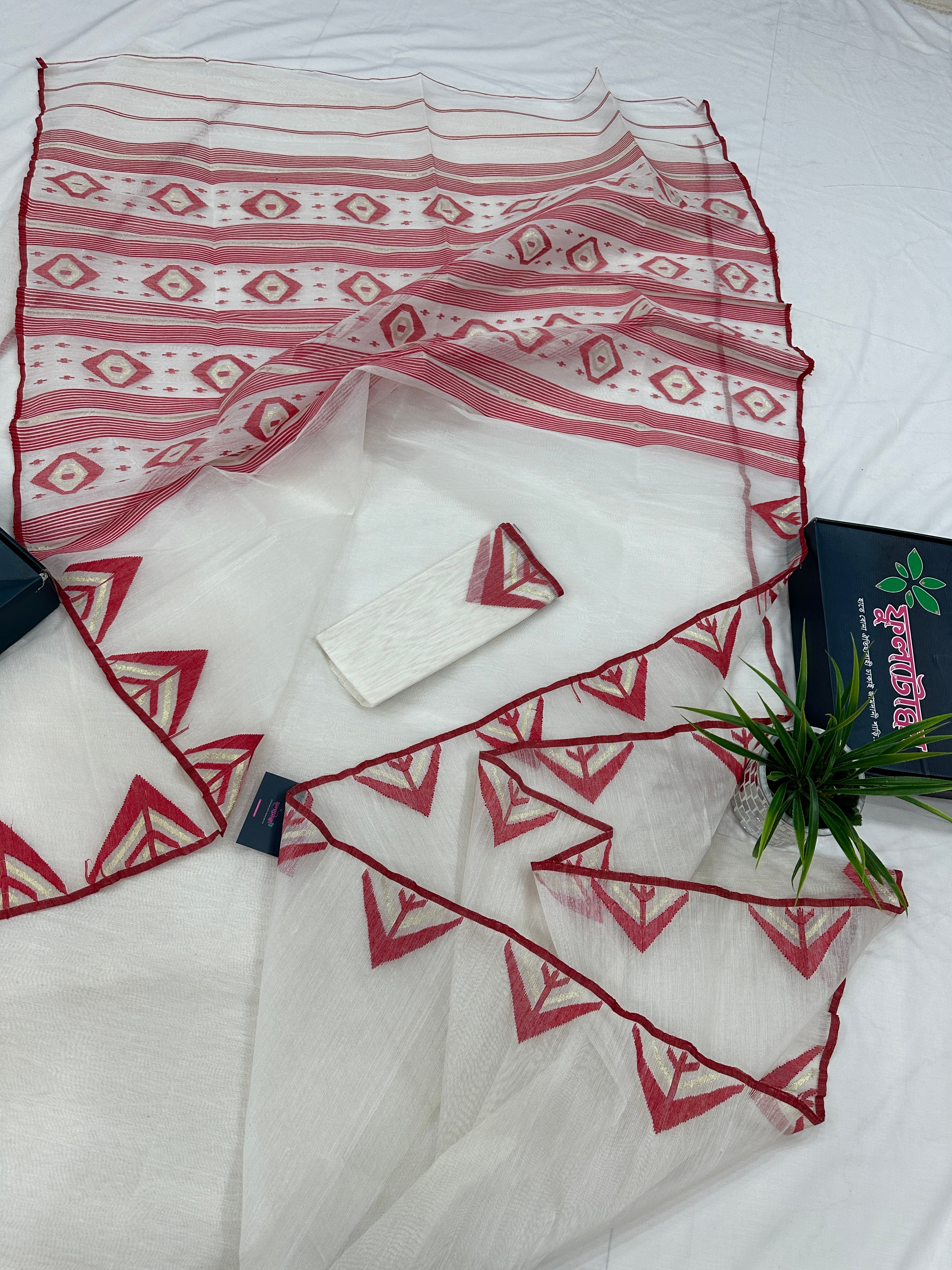 White Jamdani Saree With Red Paar.