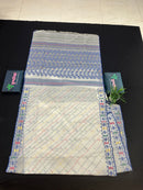 White cotton jamdani saree with blue yellow red green threads work& blouse piece.