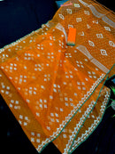 Orange soft jamdani saree with silver jori work & green border.