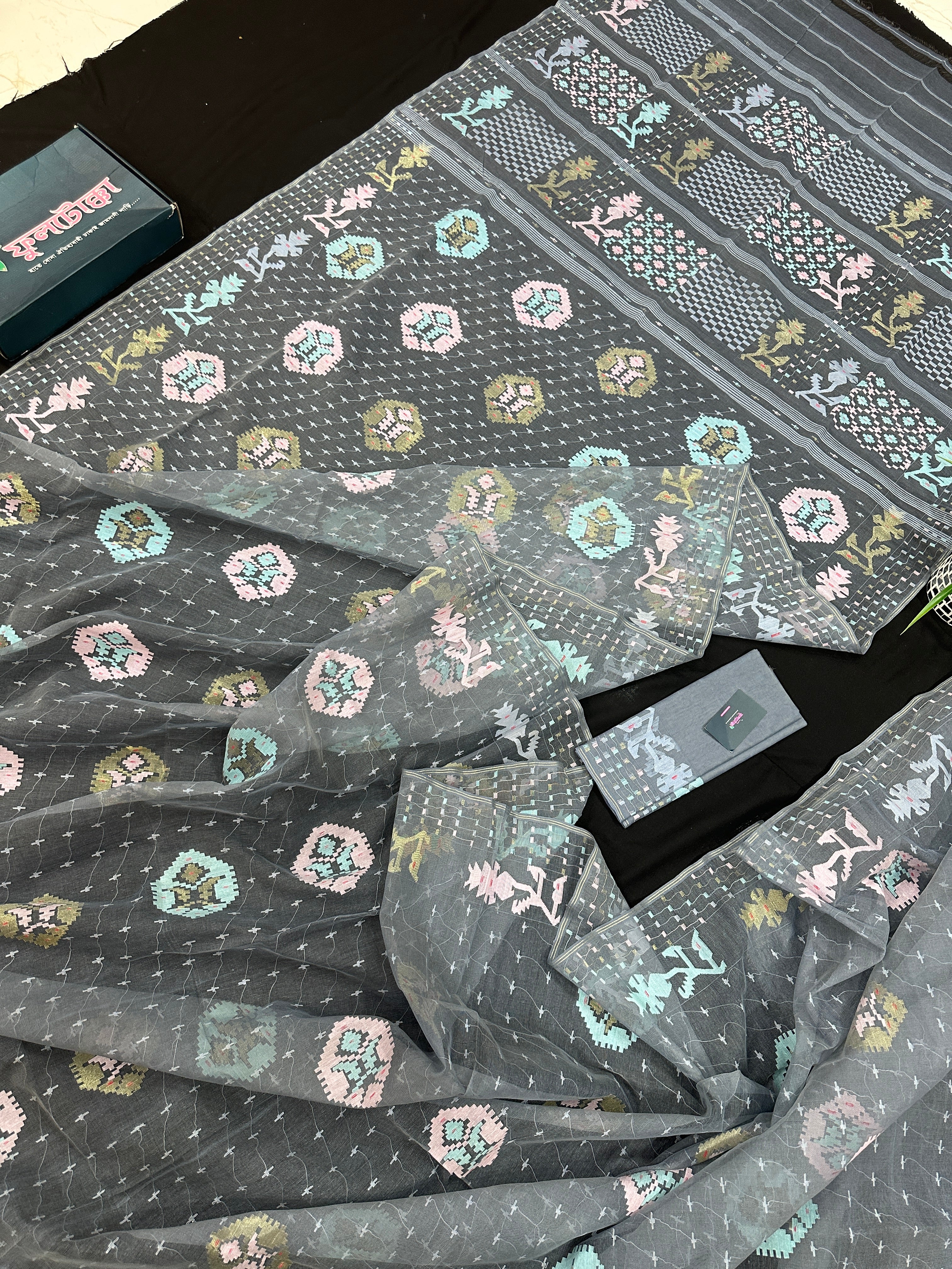 Ash jamdani saree with pink blue and with threads work and golden jori work.