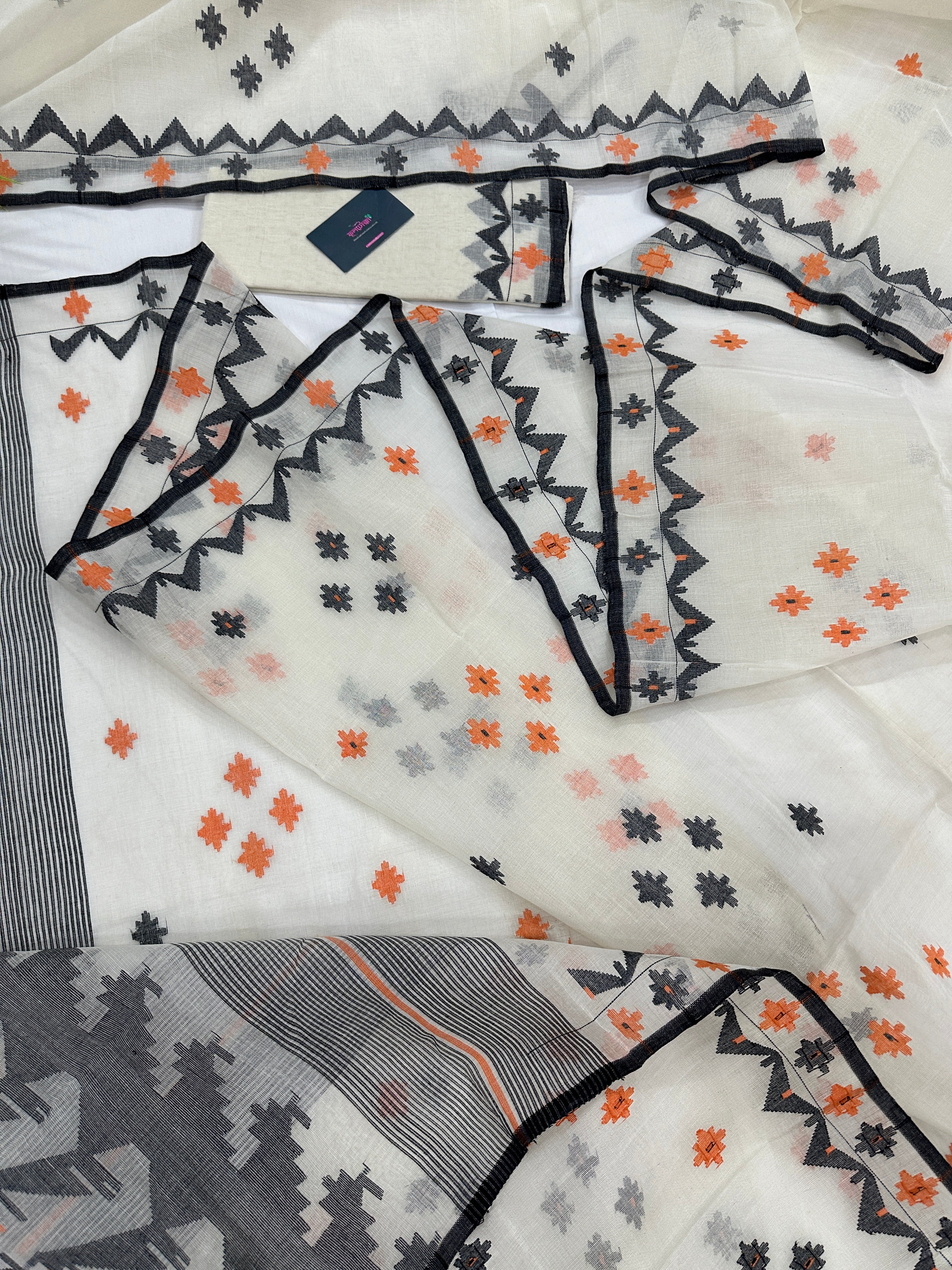 White cotton jamdani saree with orange & black threads work.
