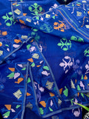 Royal blue jamdani saree with green pink blue orange threads work.