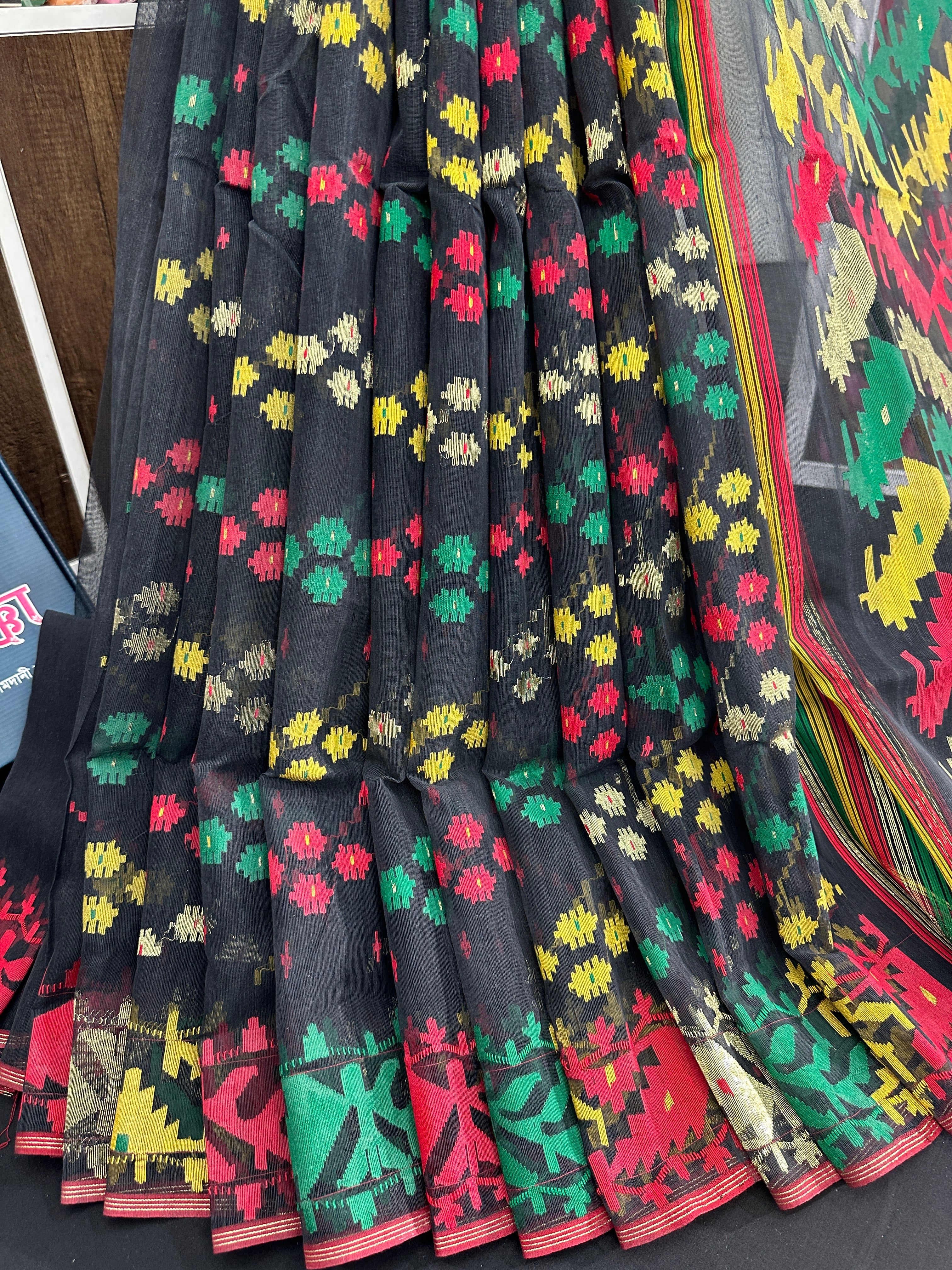 Black cotton jamdani saree with red green yellow multiple threads work