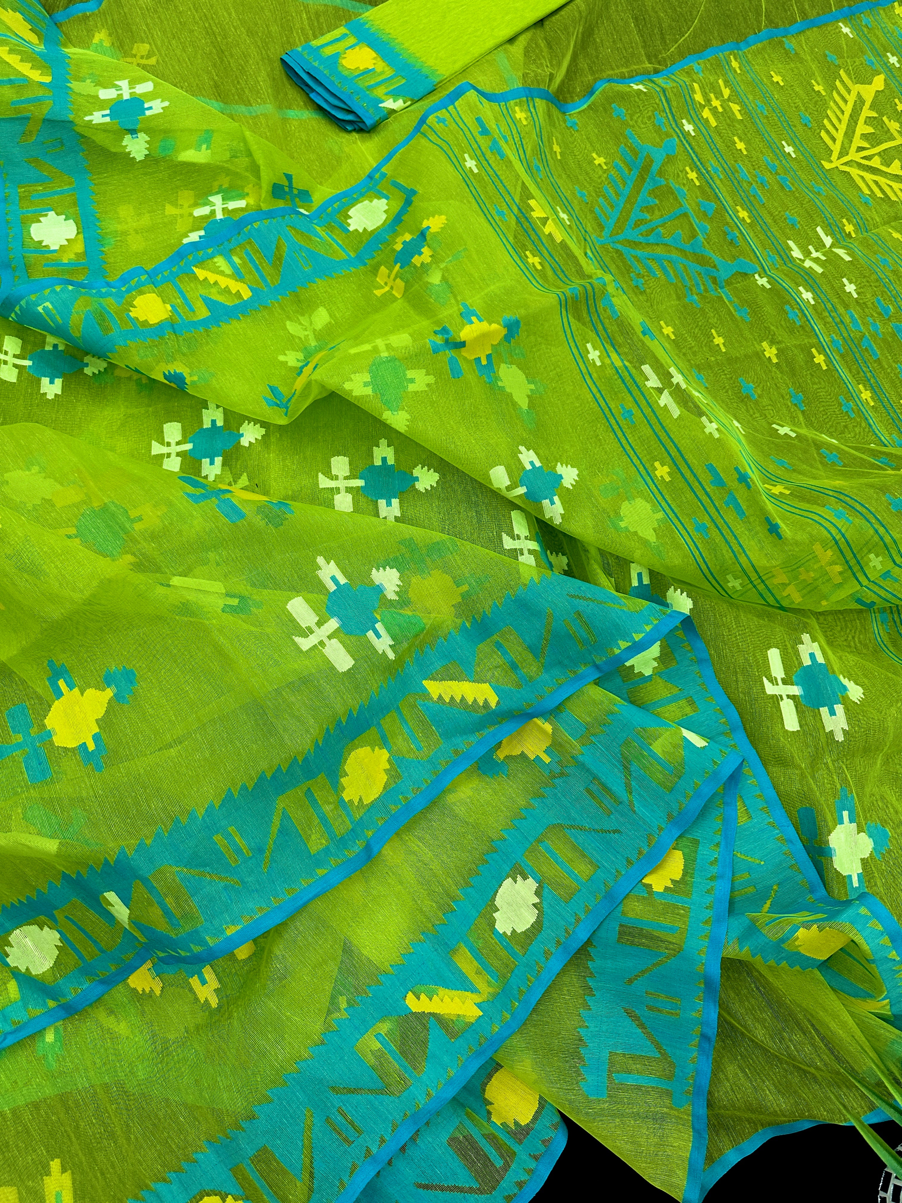 Parrot green jamdani saree with multi colour work with blue Paar.
