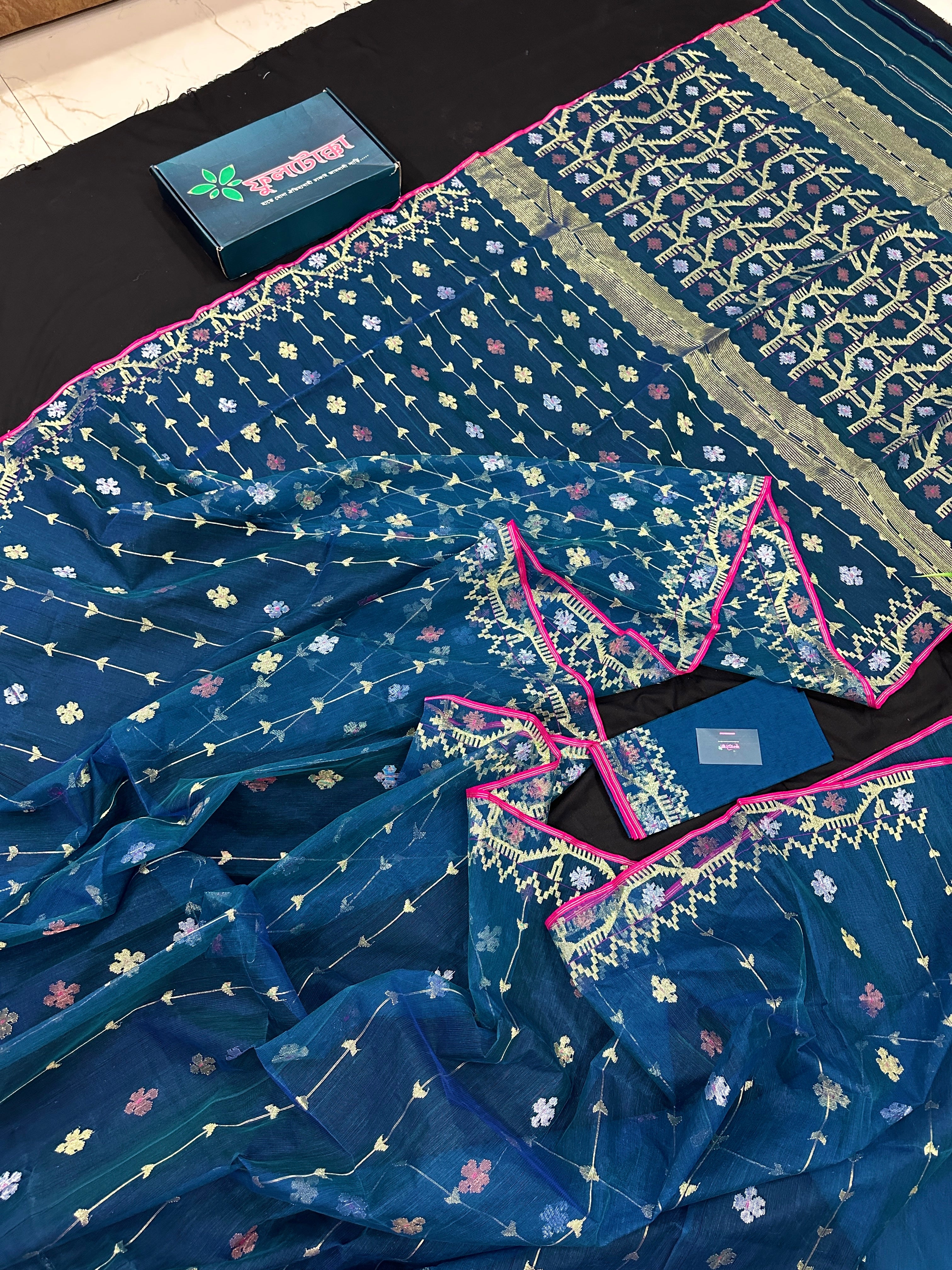 Peacock blue jamdani saree with golden silver copper jori work and pink border